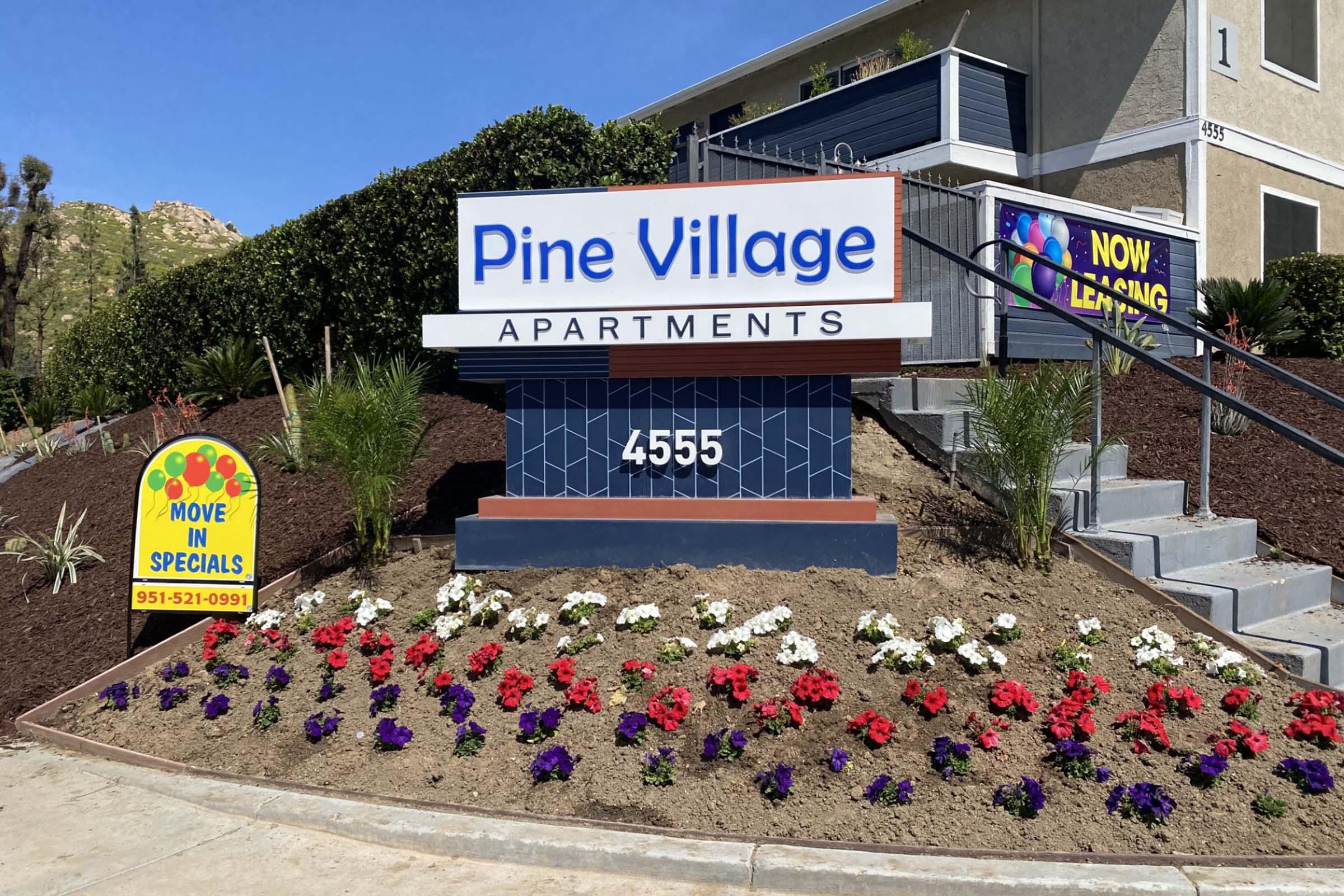 a sign in front of a building