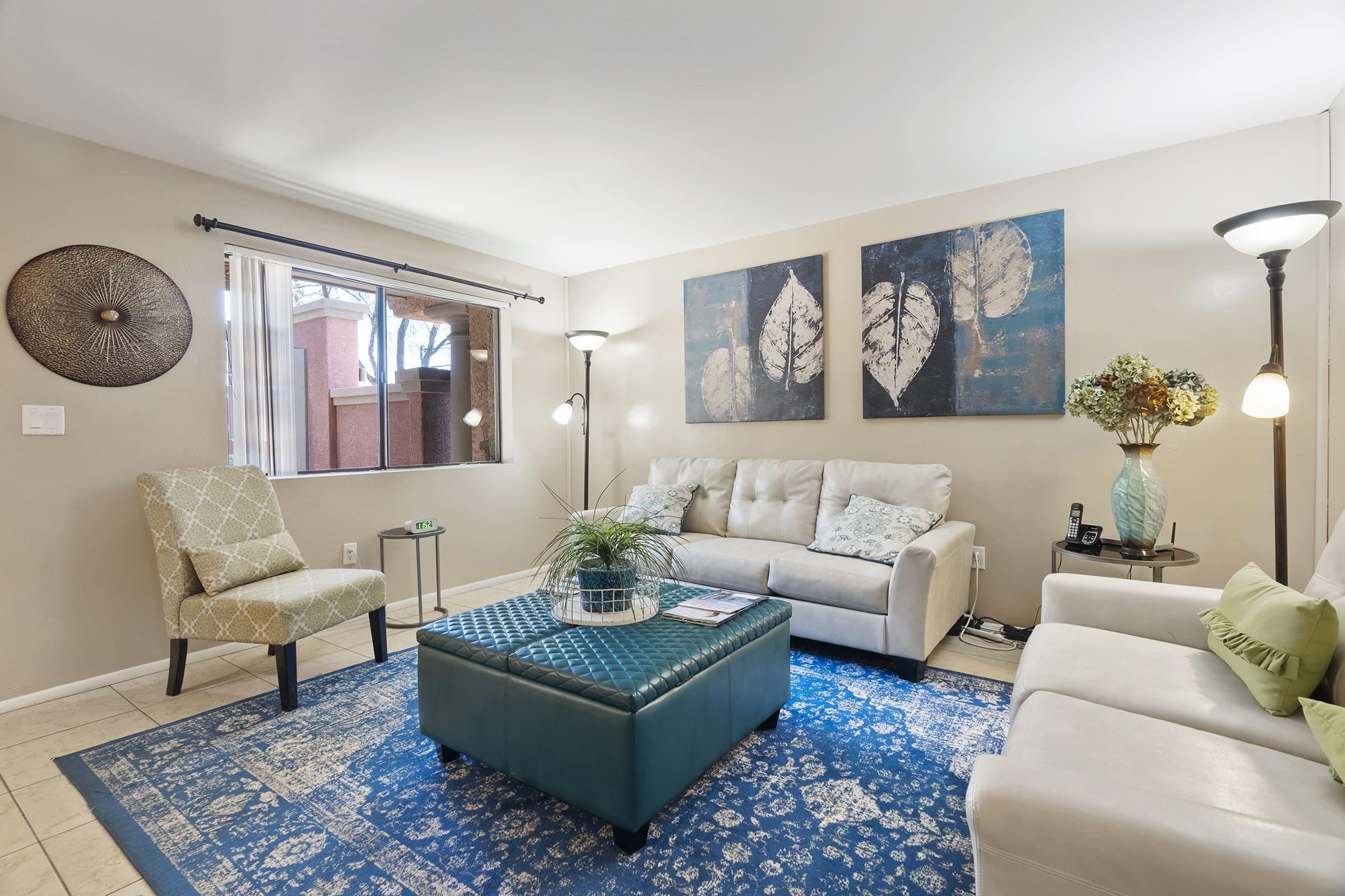 a living room with blue walls