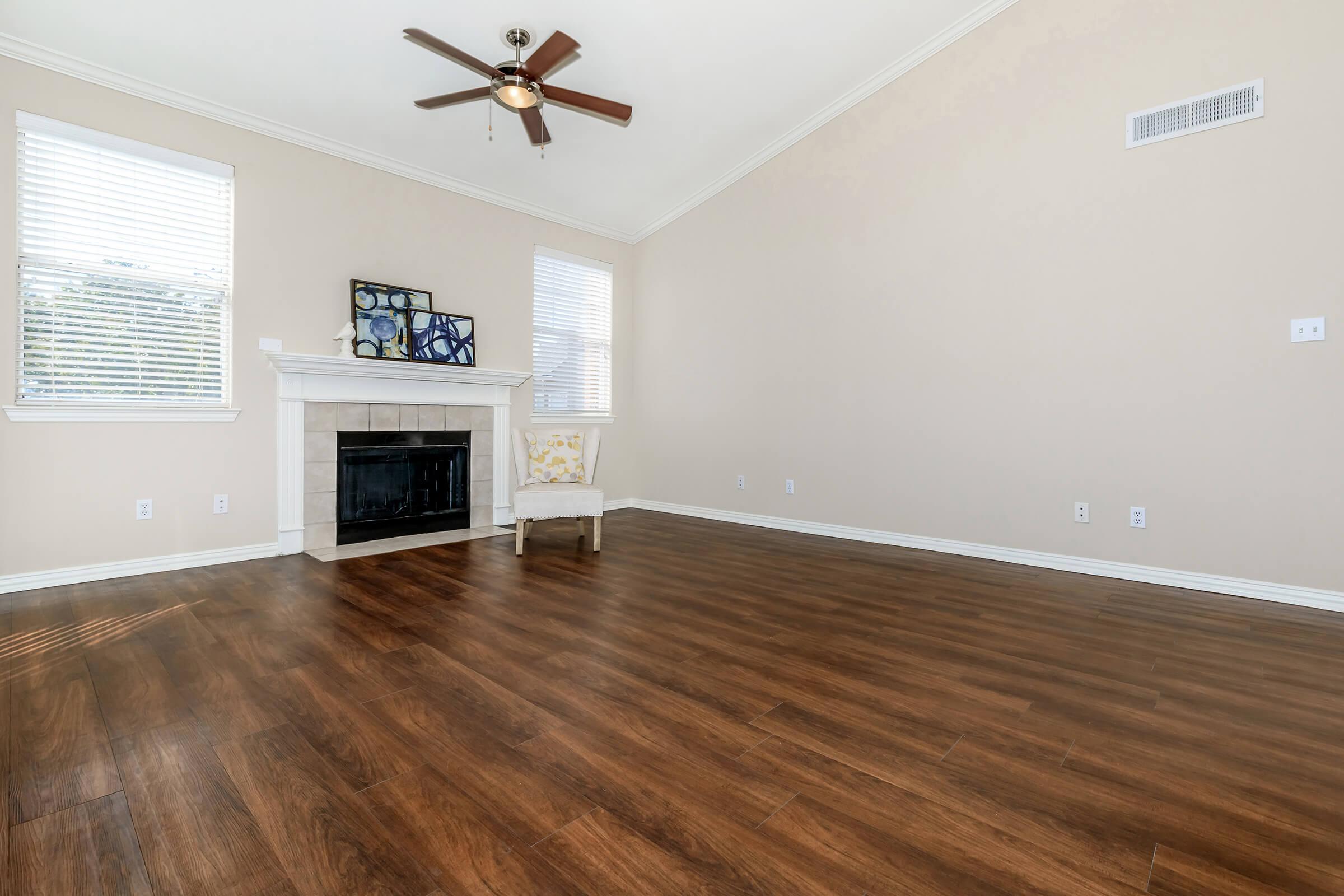 a living room with a wood floor