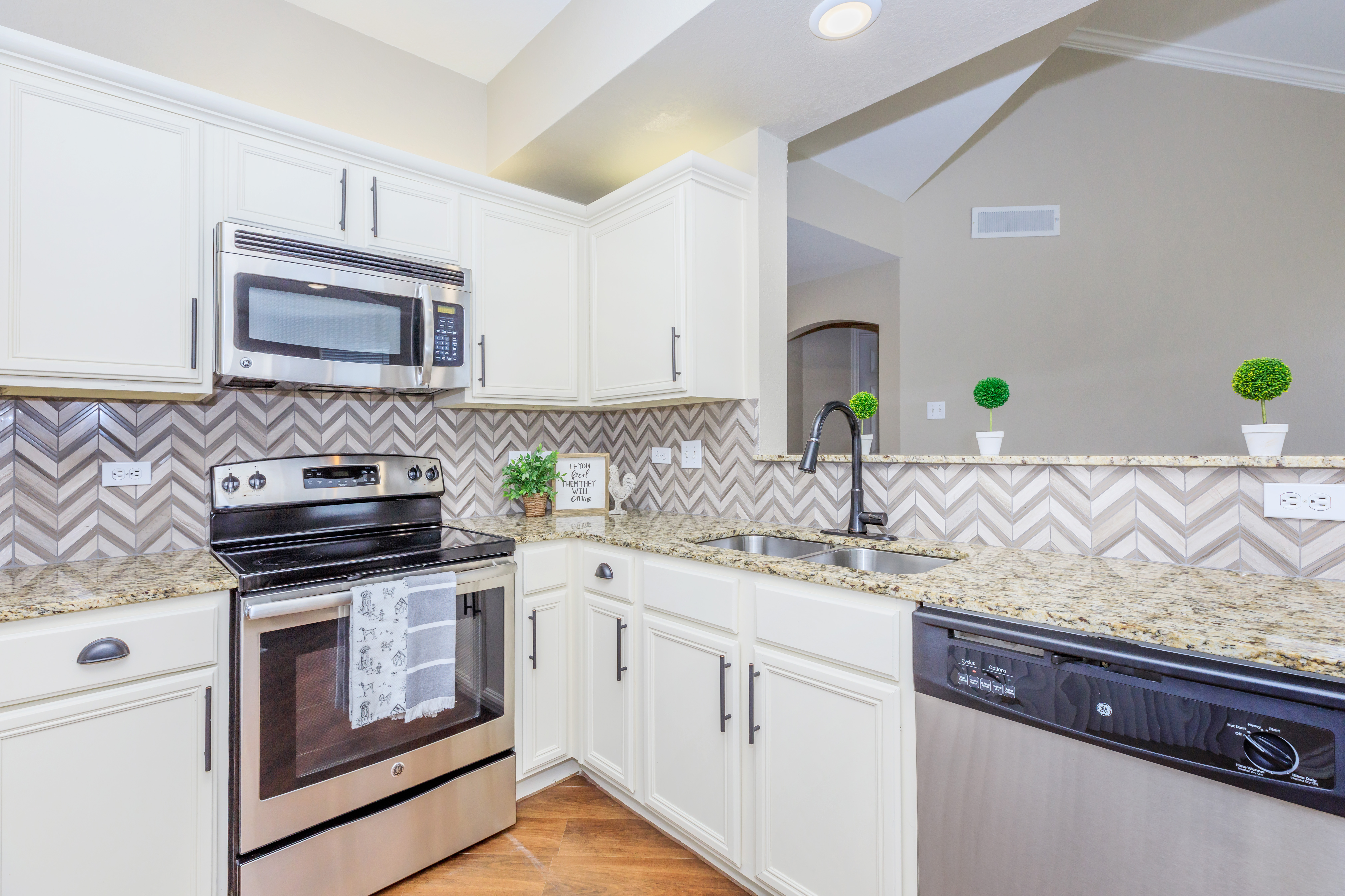 a kitchen with stainless steel appliances