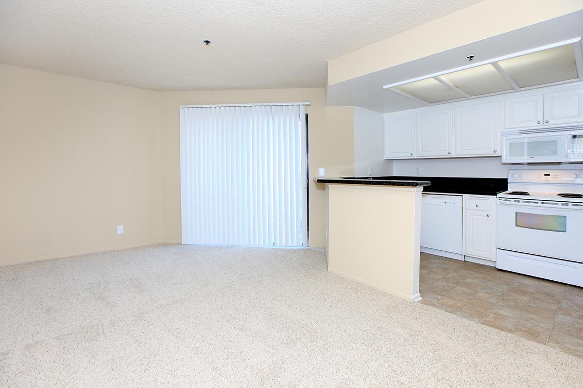 a large white refrigerator in a kitchen