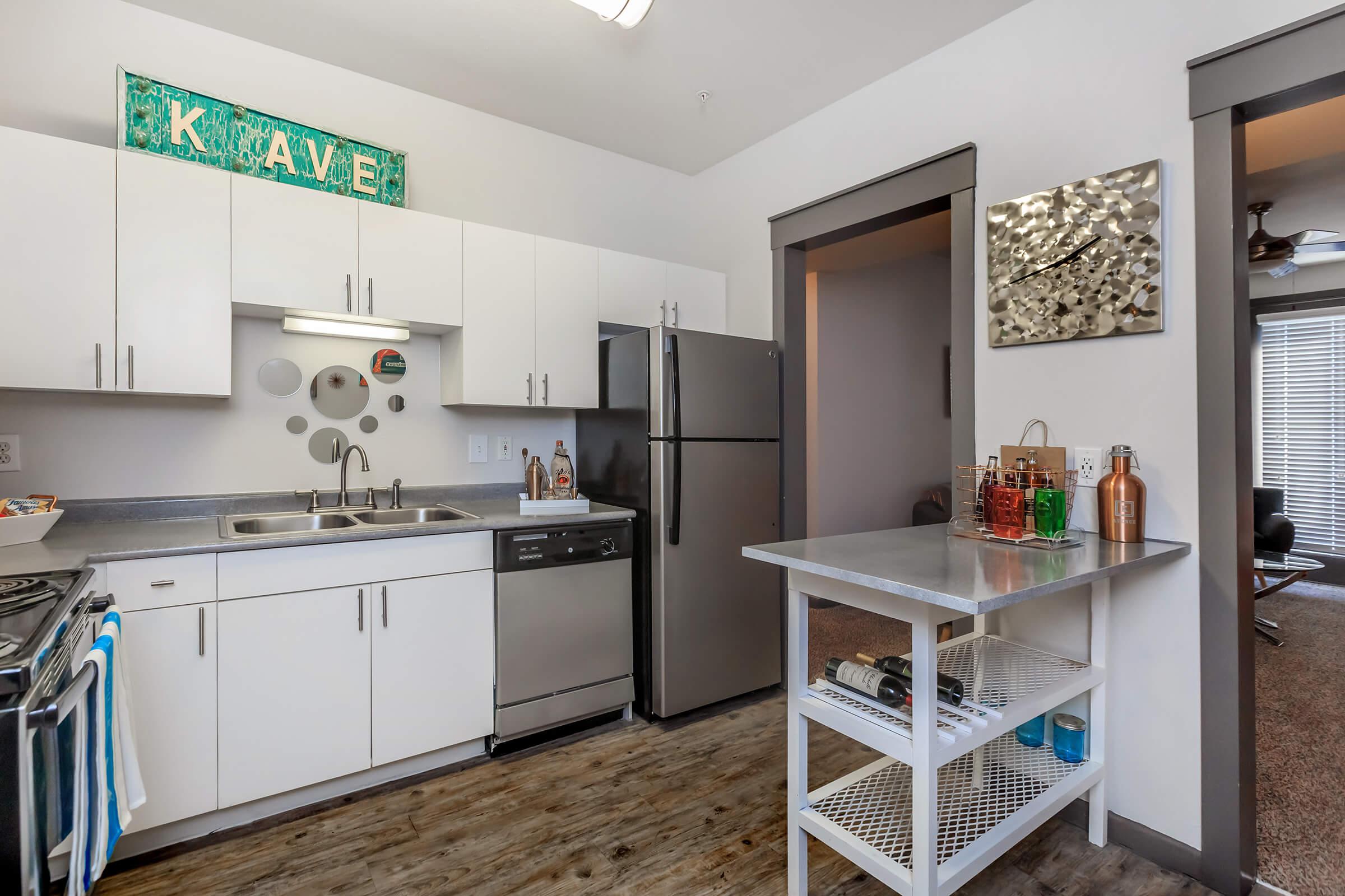 a large white refrigerator in a kitchen