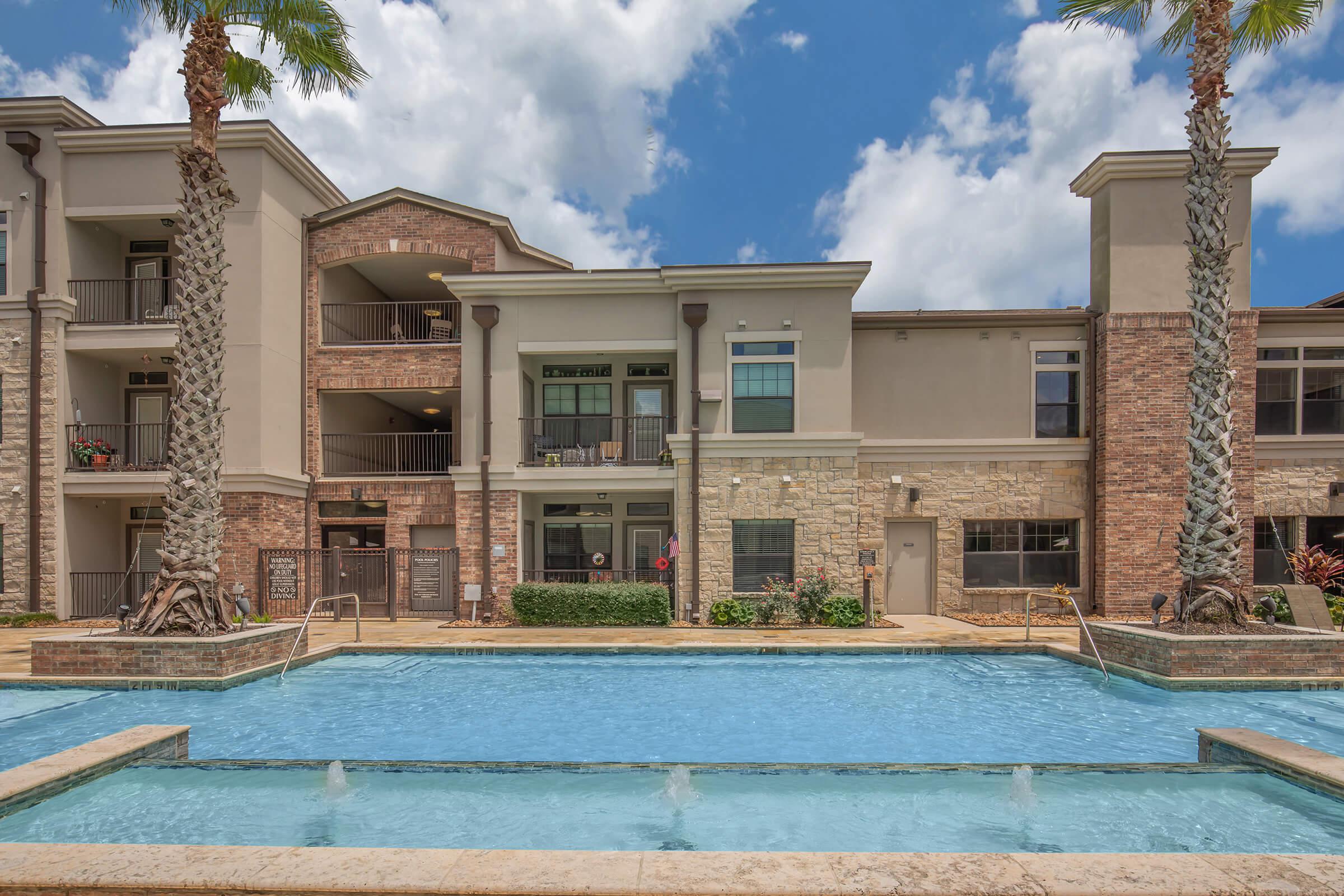 a pool of water in front of a building