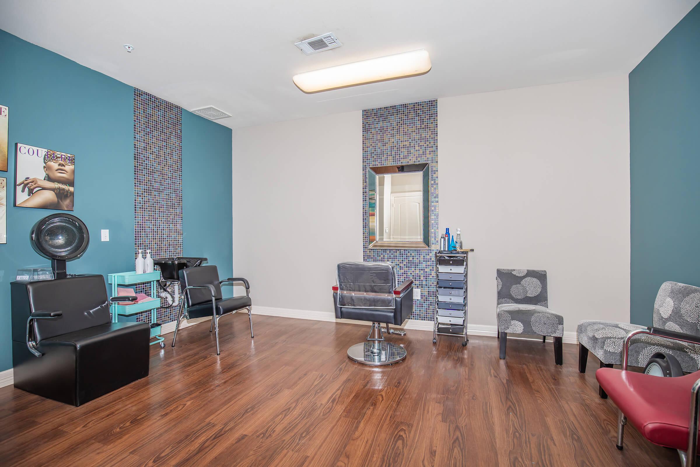 a living room filled with furniture and a flat screen tv