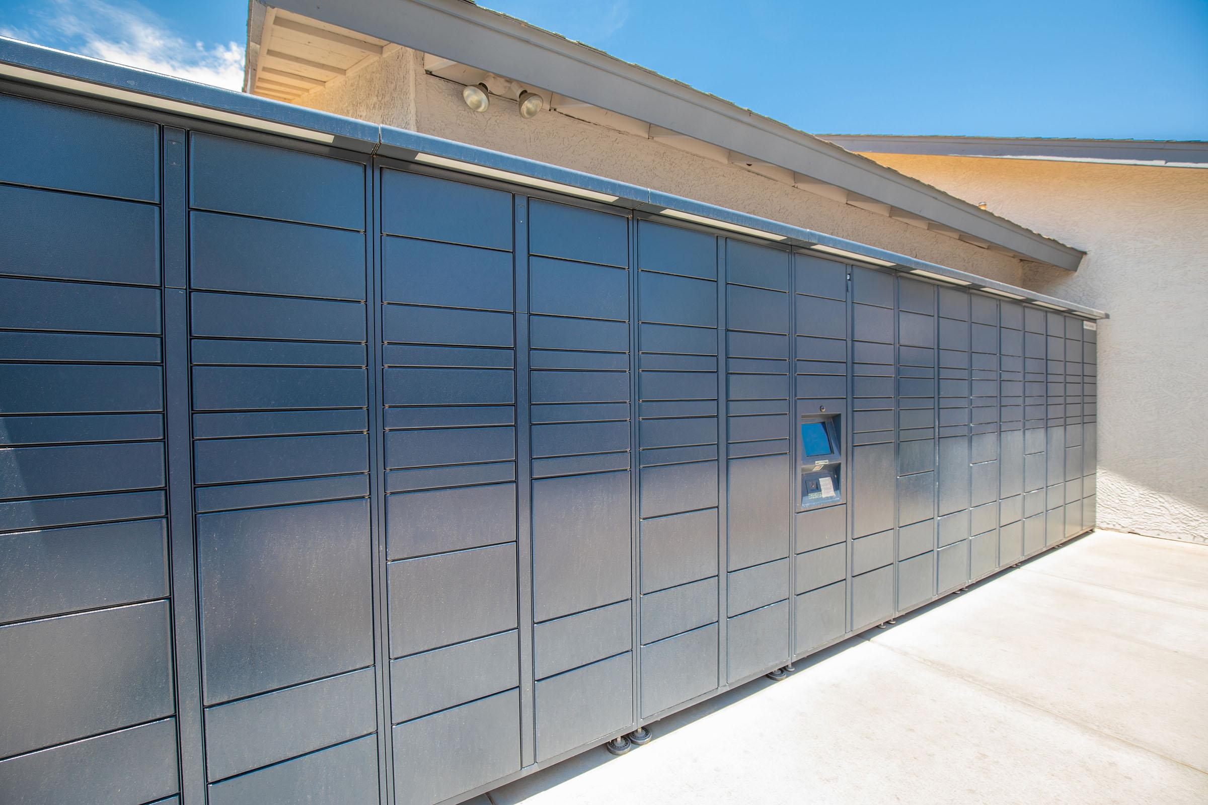 Rows of metal mailboxes outside at Rise at the District Mesa, AZ apartments for rent
