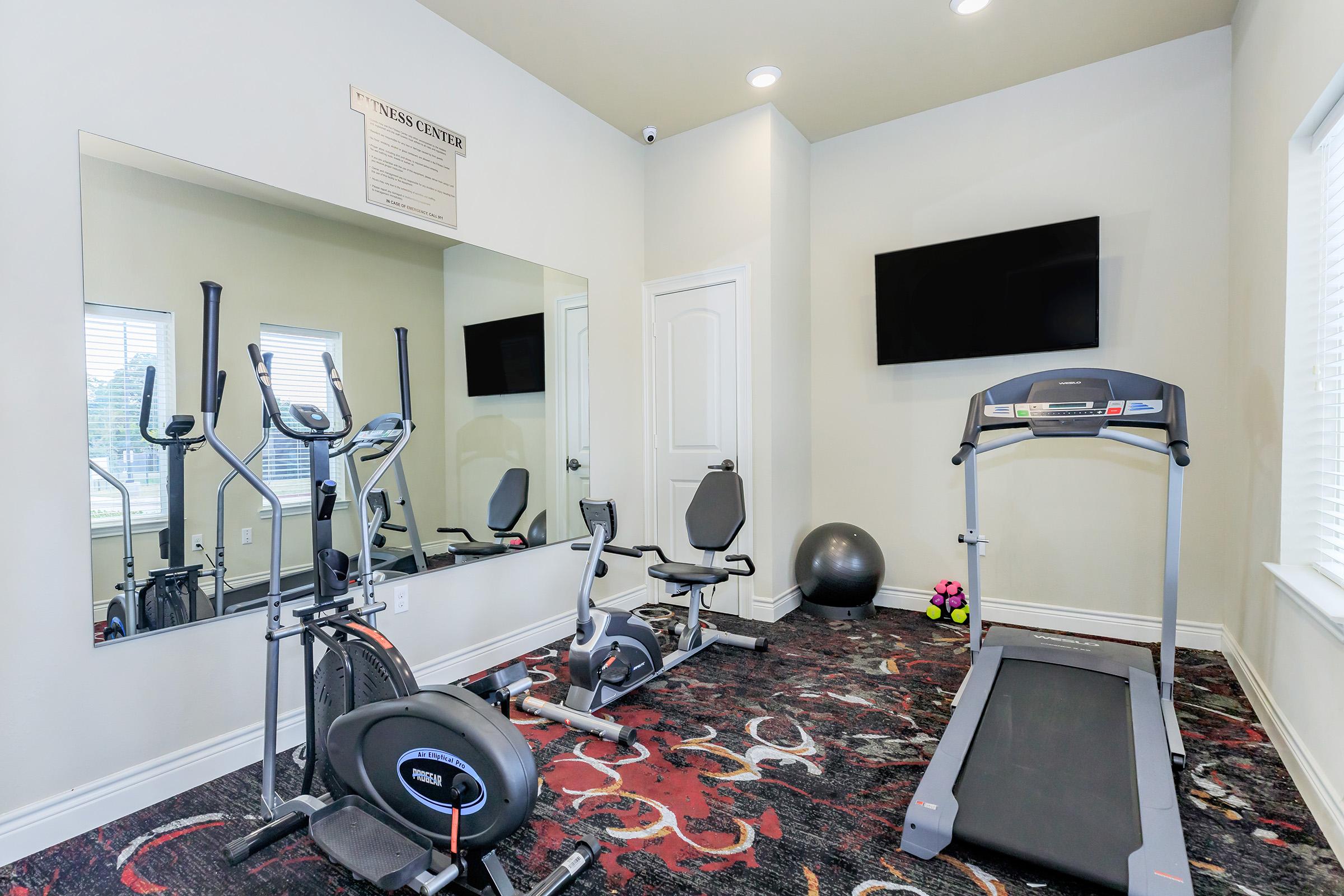 a room filled with furniture and a motorcycle