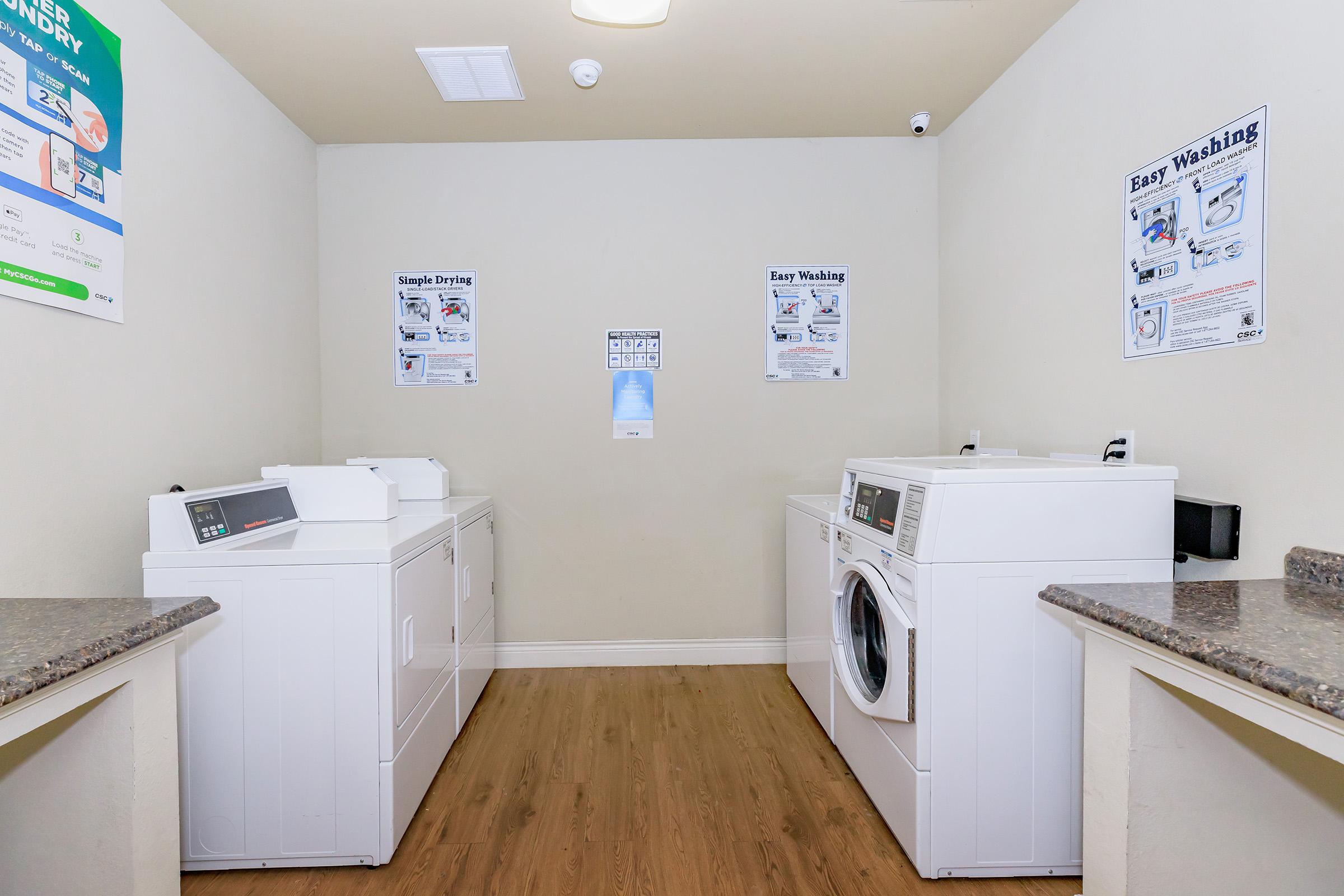 a kitchen with a sink and a refrigerator