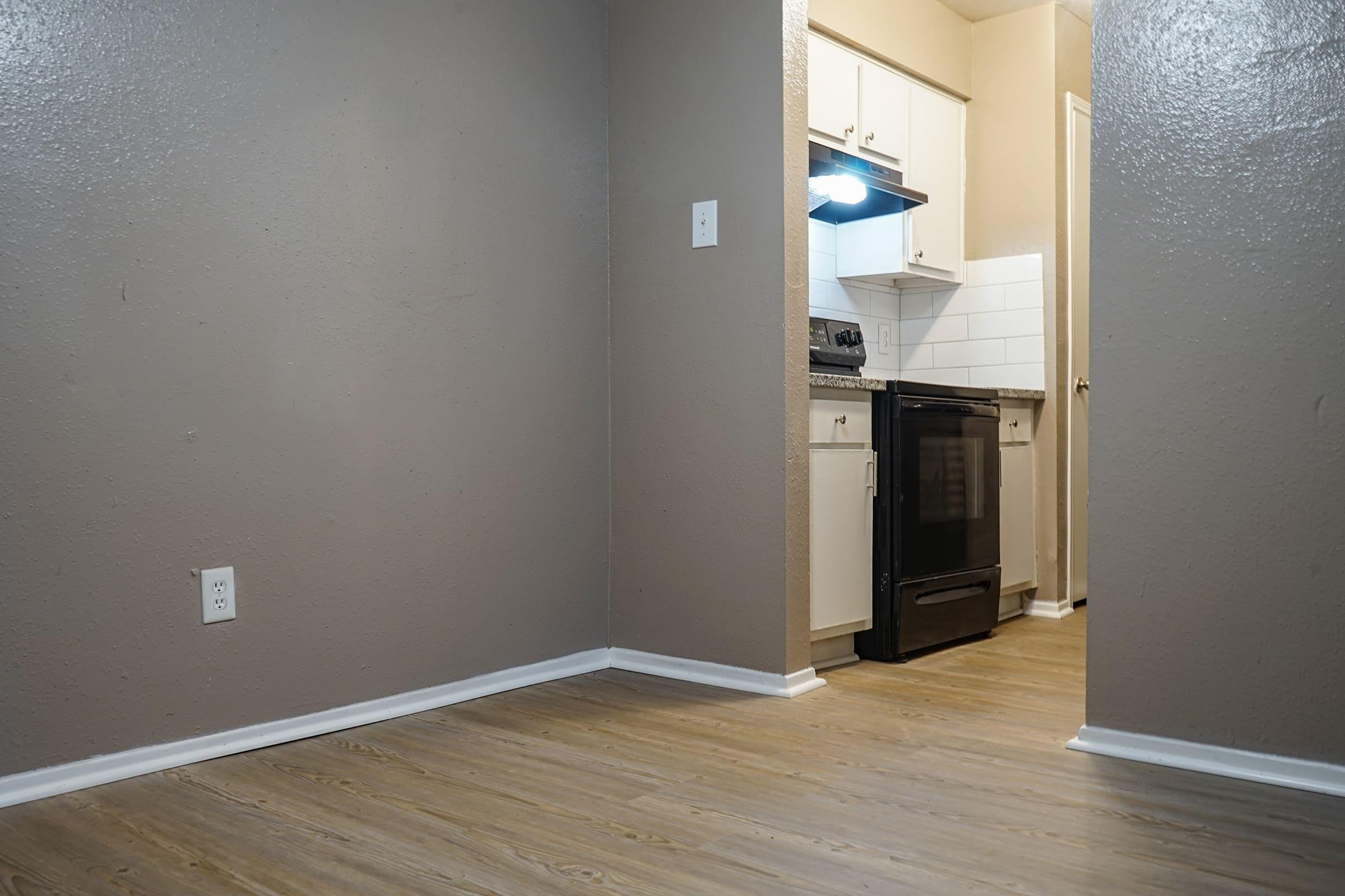 a refrigerator freezer sitting inside of a building