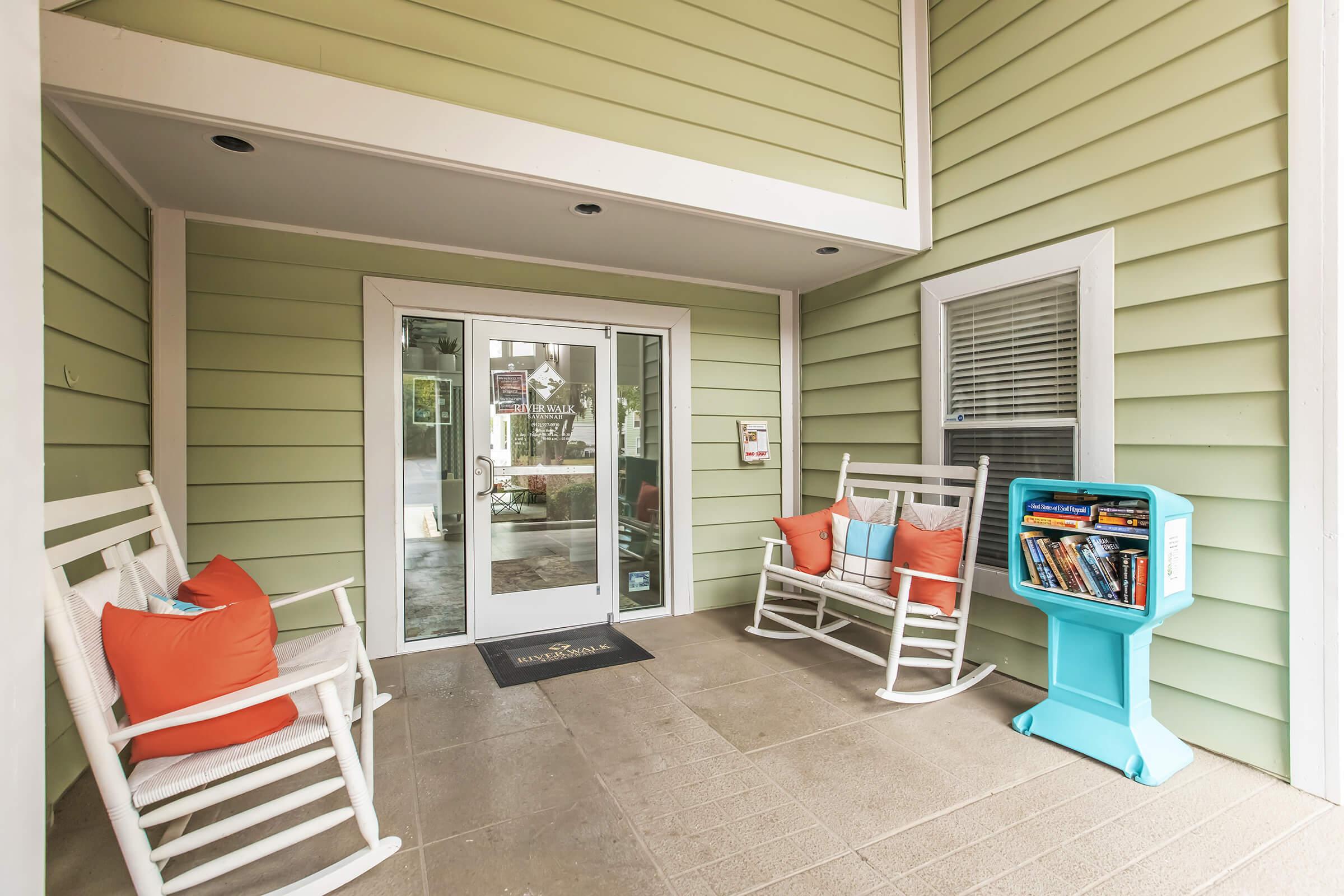 a chair sitting in front of a house