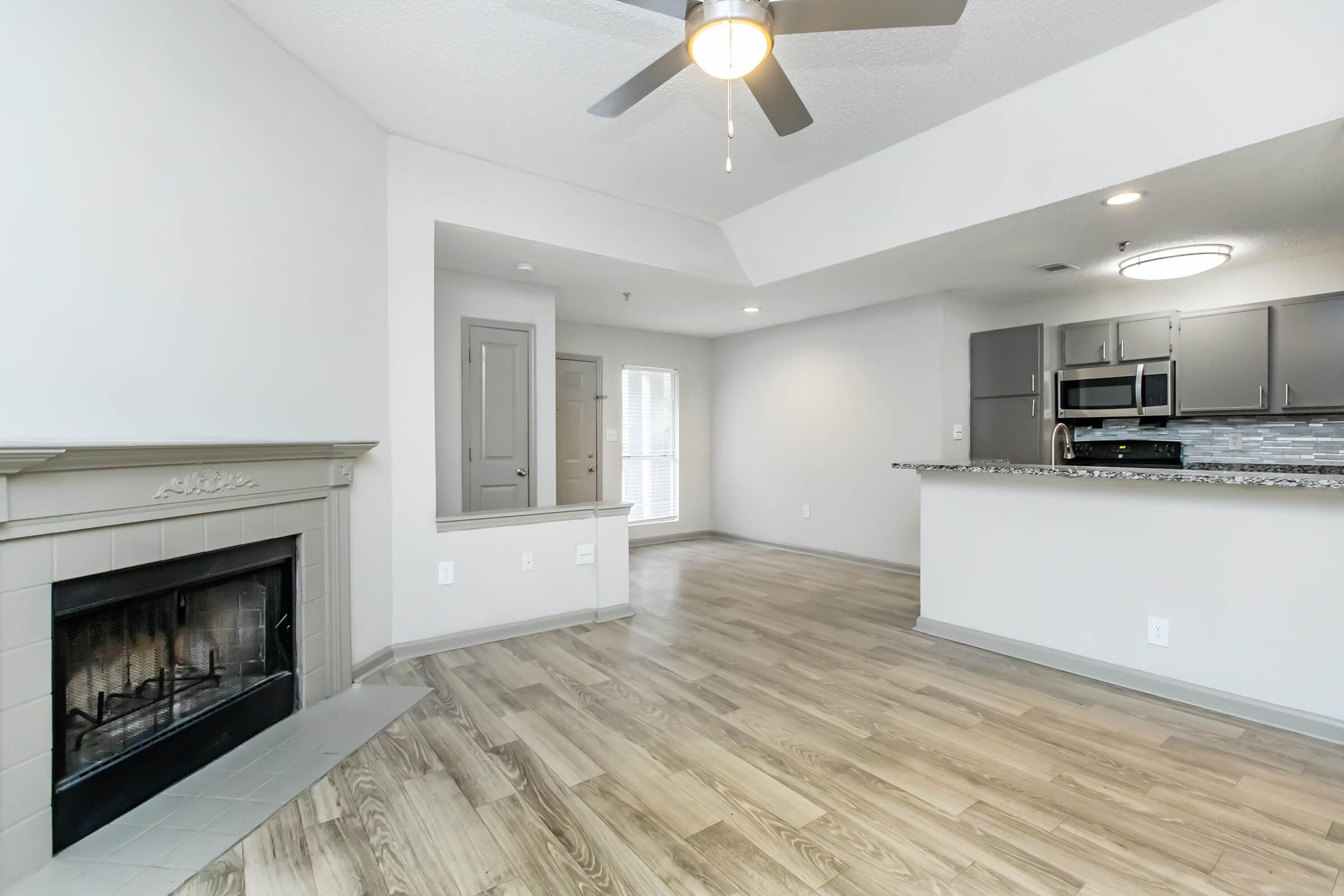 a room filled with furniture and a fireplace