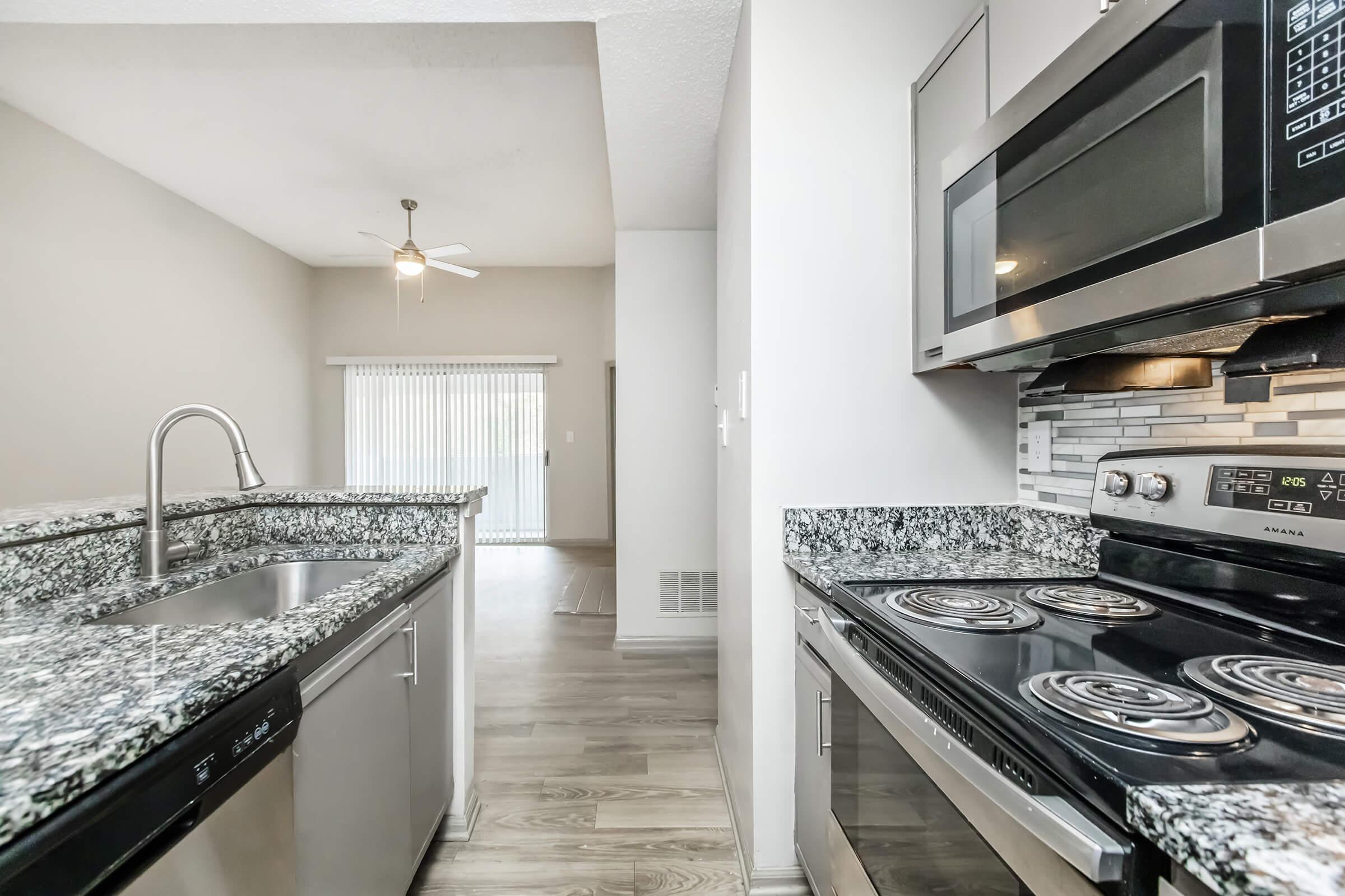 a modern kitchen with stainless steel appliances