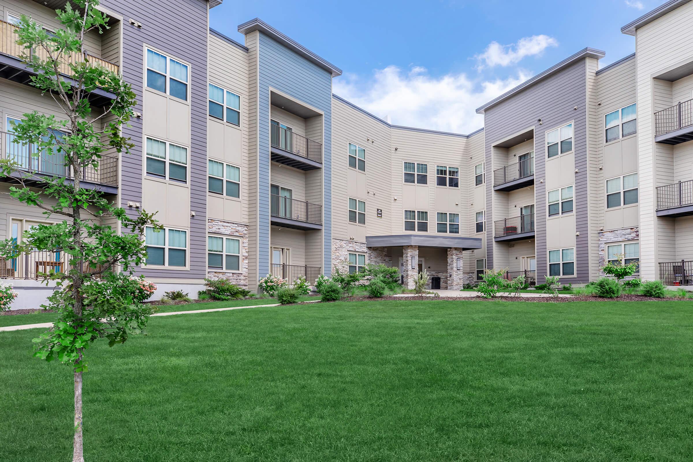 a large lawn in front of a building