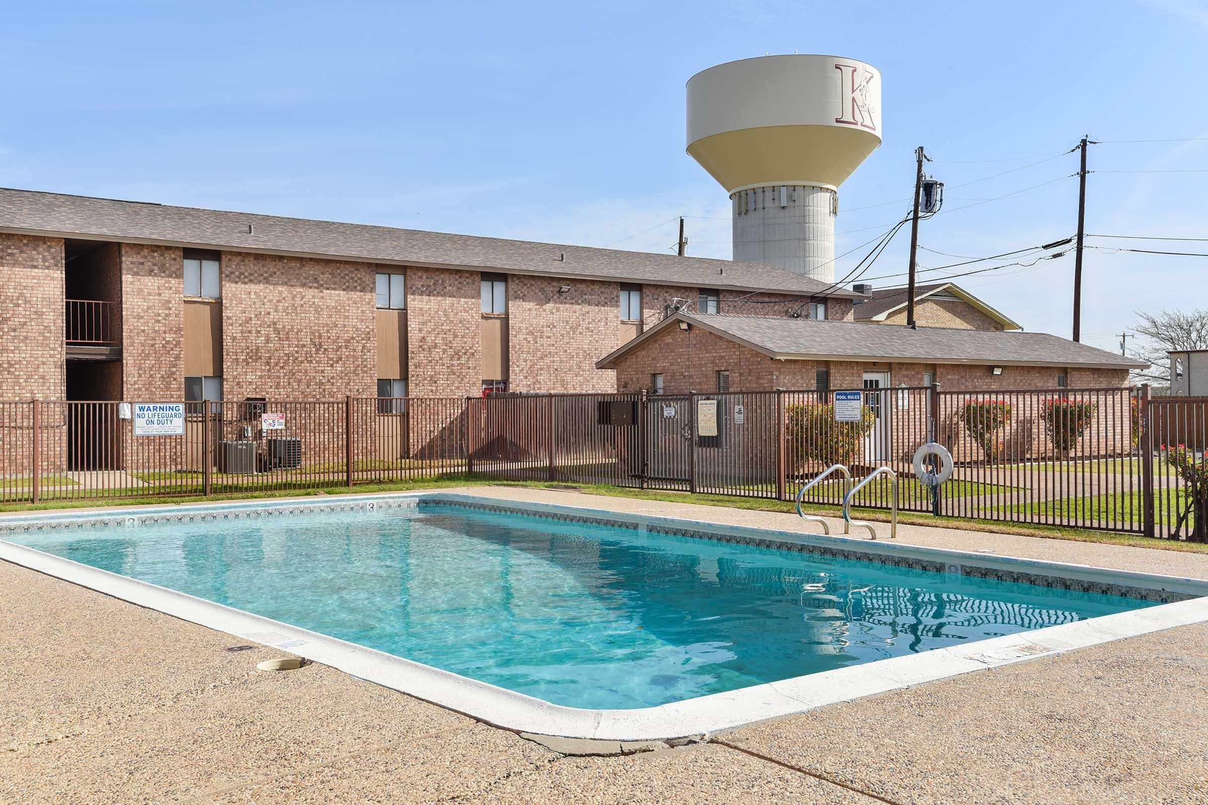 a pool next to a body of water