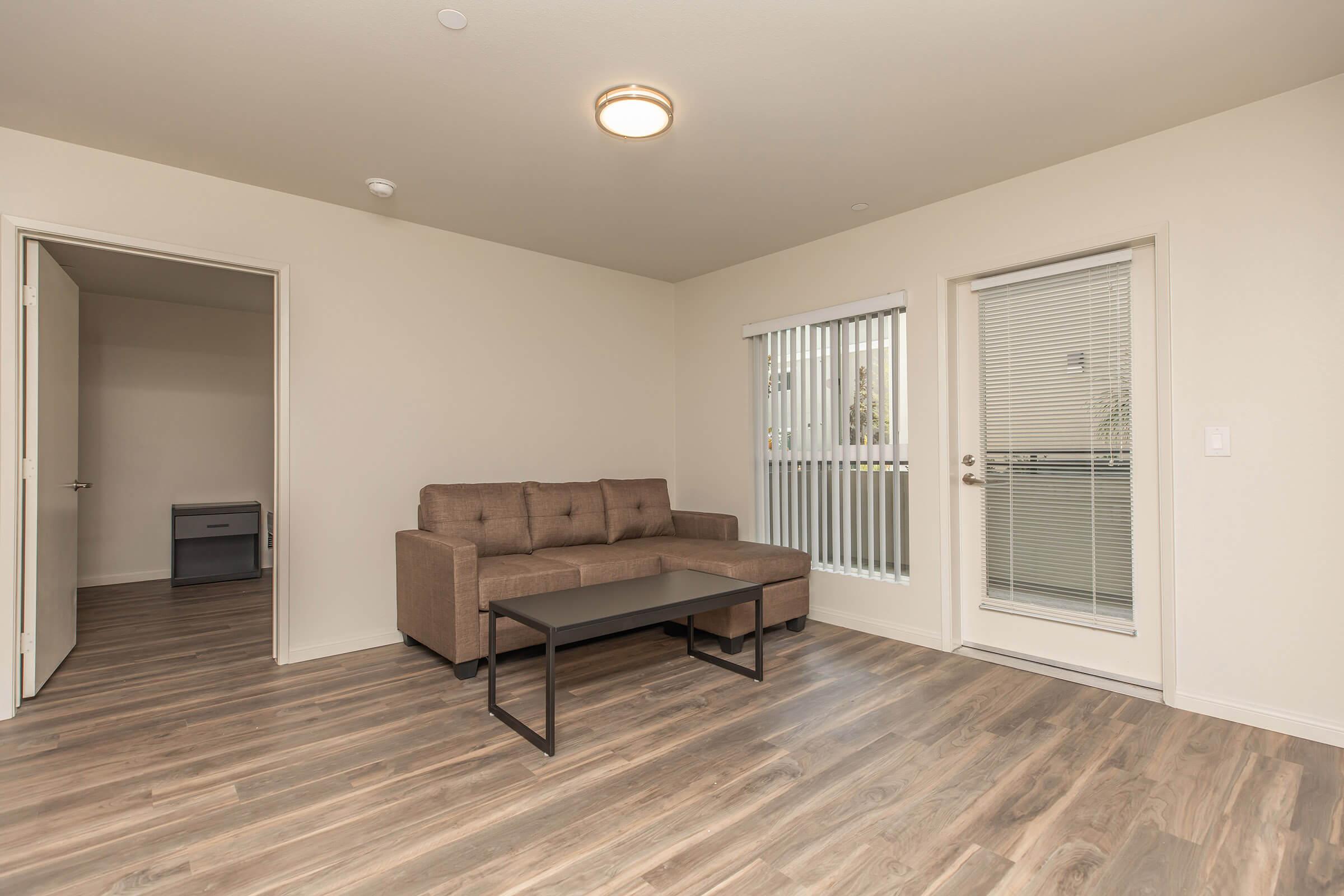 a living room with a wood floor