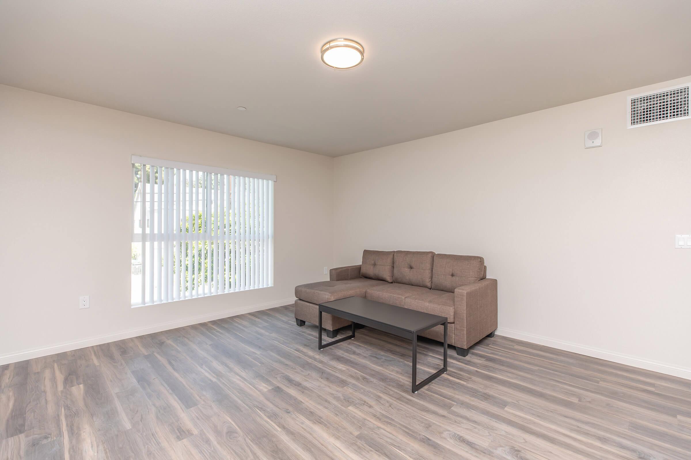 a living room with a wood floor