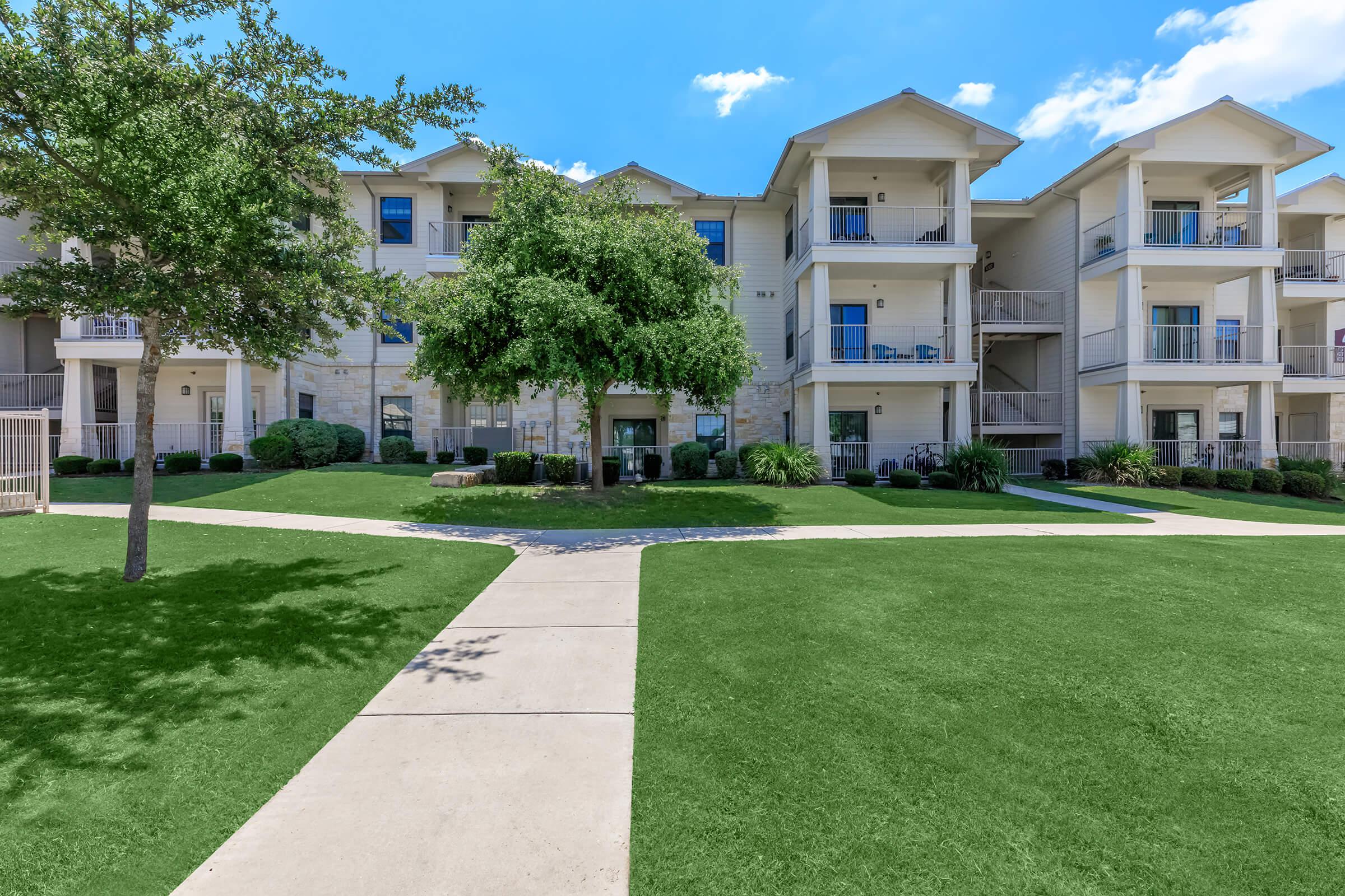 a large lawn in front of a house