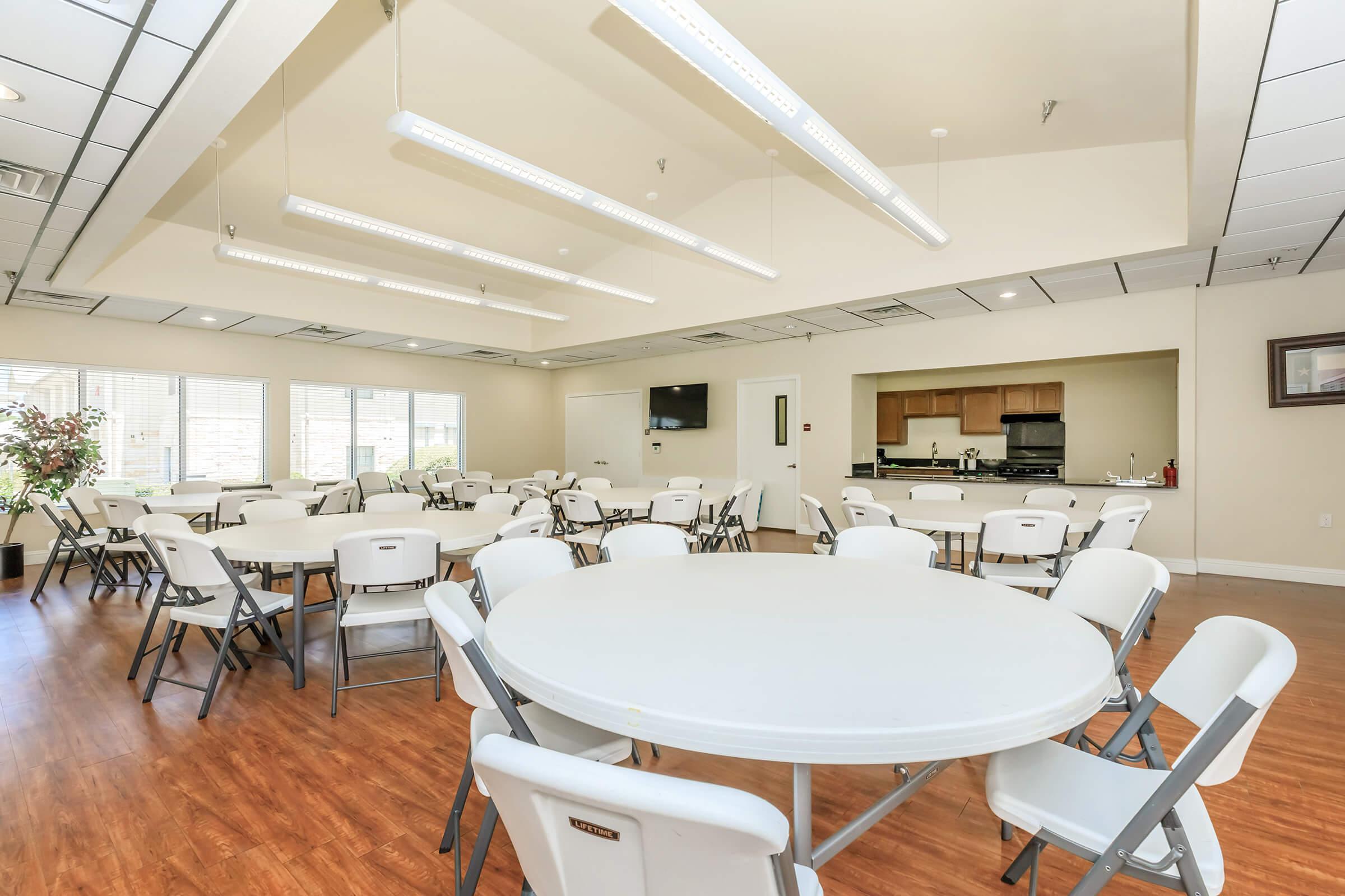 a room filled with furniture and a table