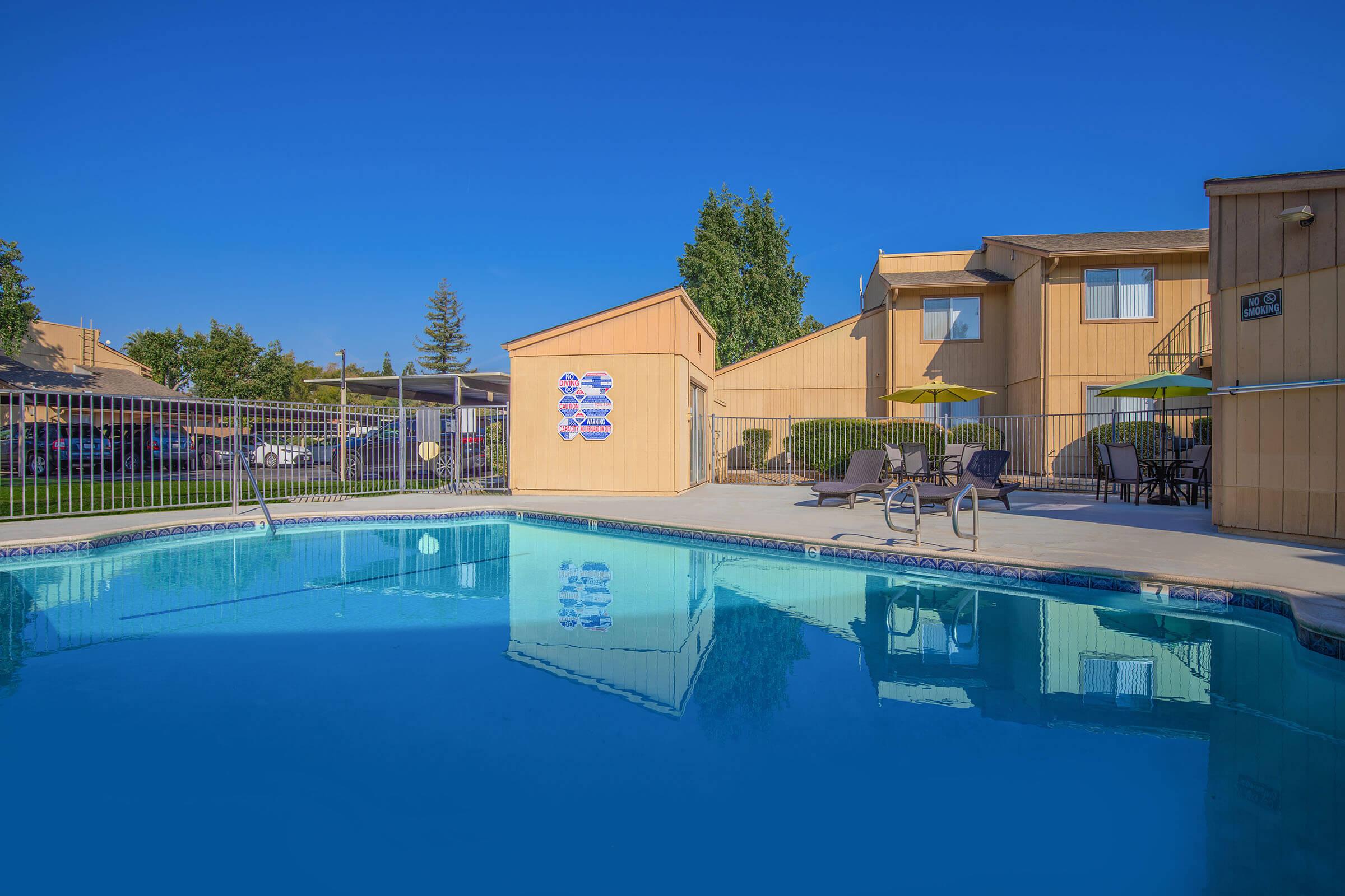 a pool in front of a building