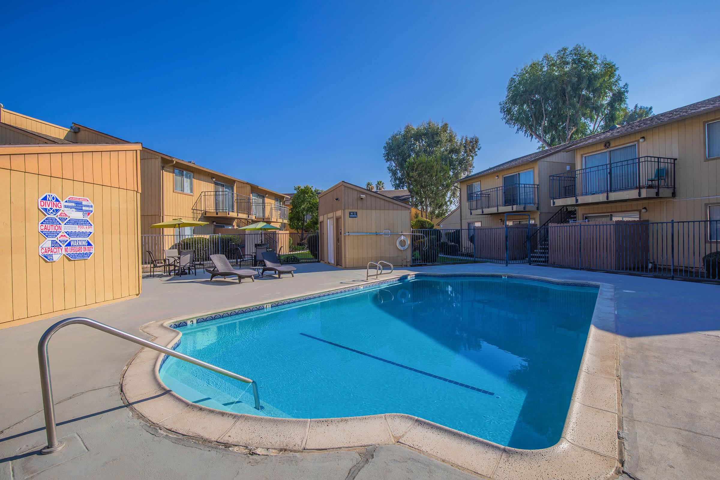 a pool next to a building