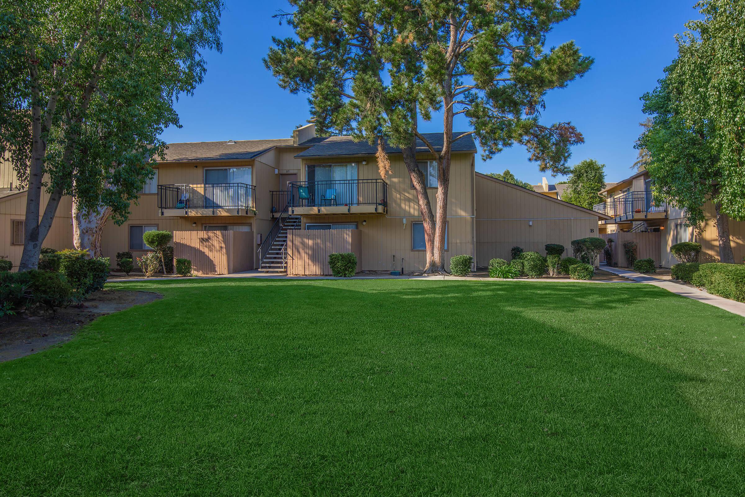 a large lawn in front of a house