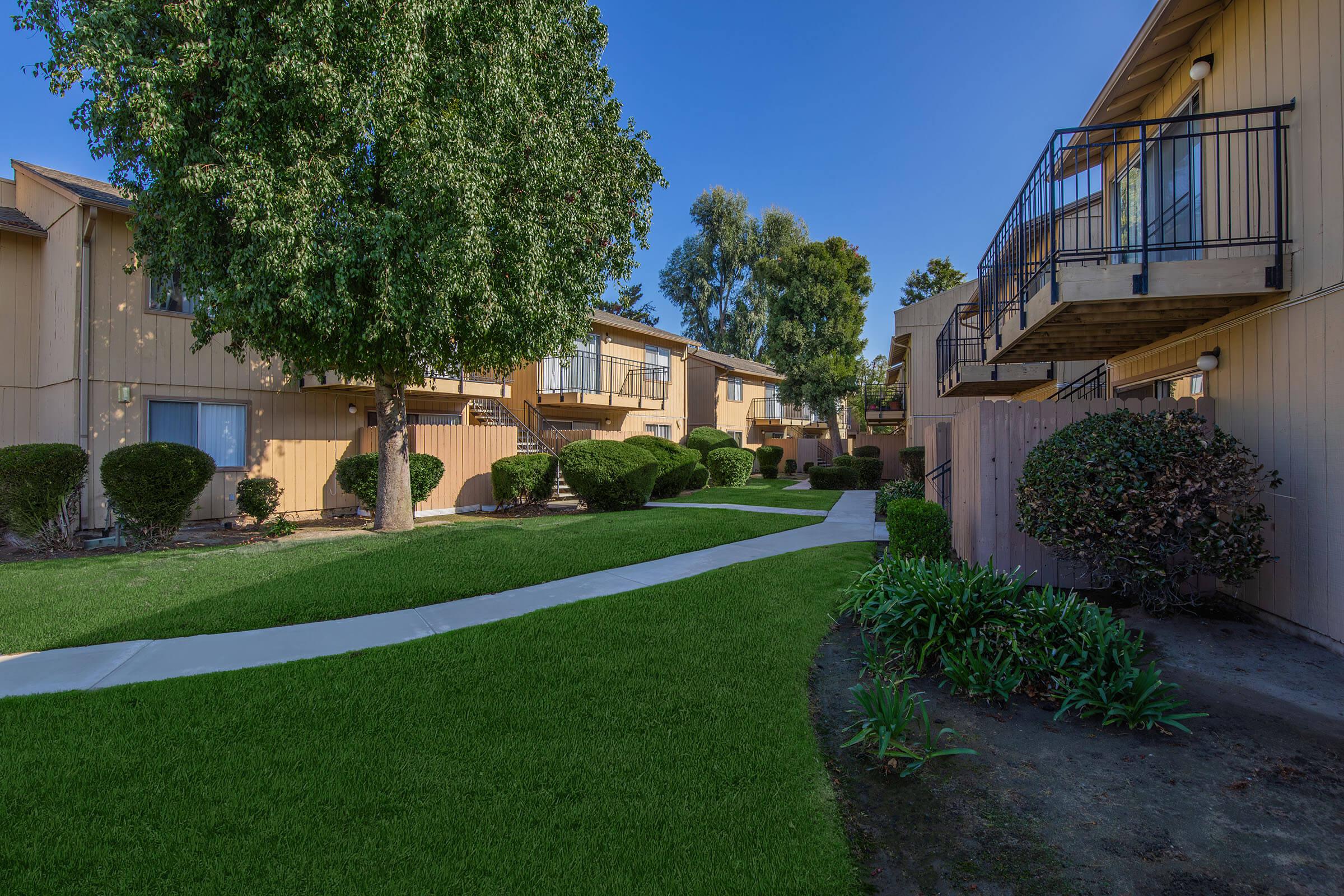 a large lawn in front of a house