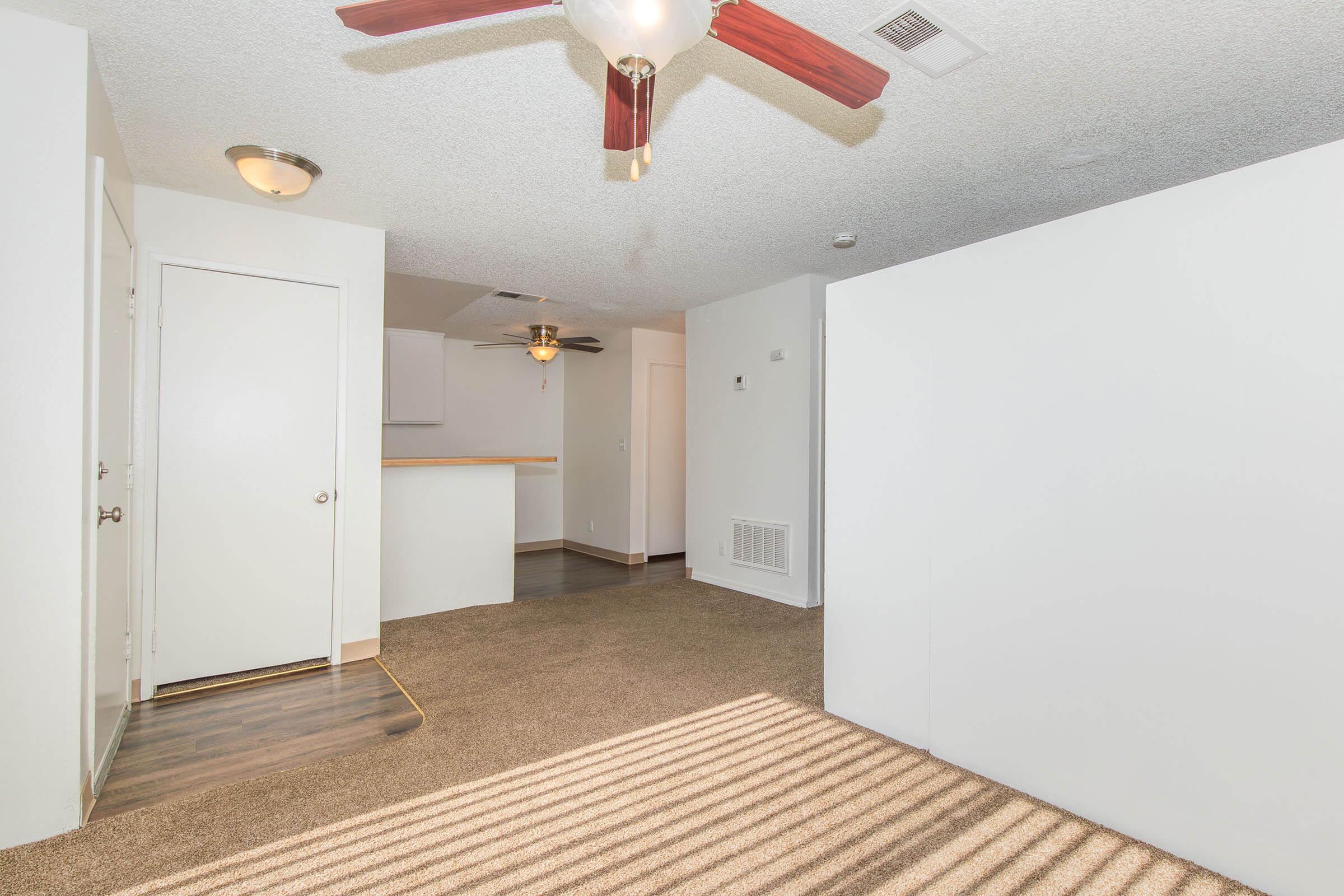 a refrigerator in a small room