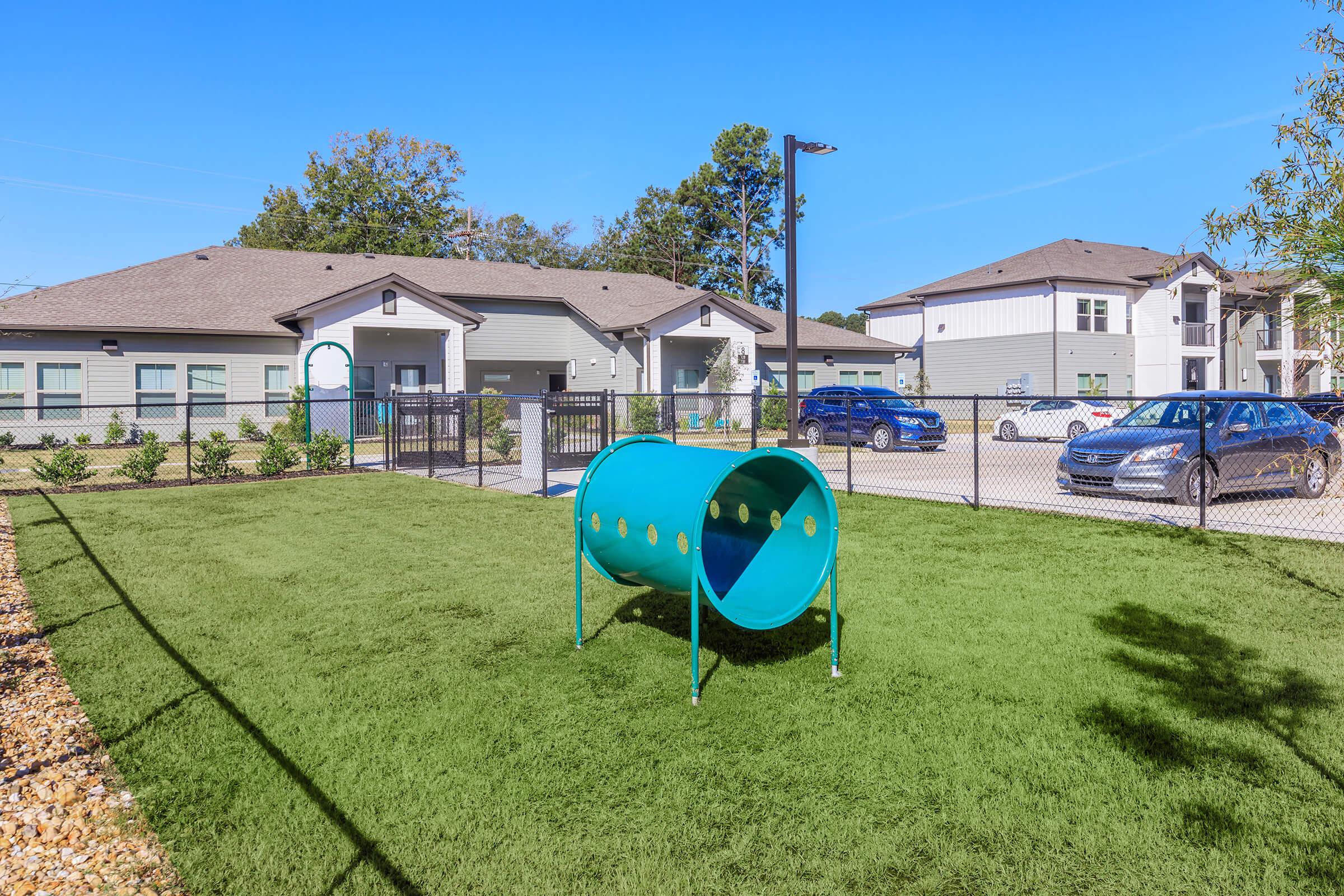 a green lawn in front of a house