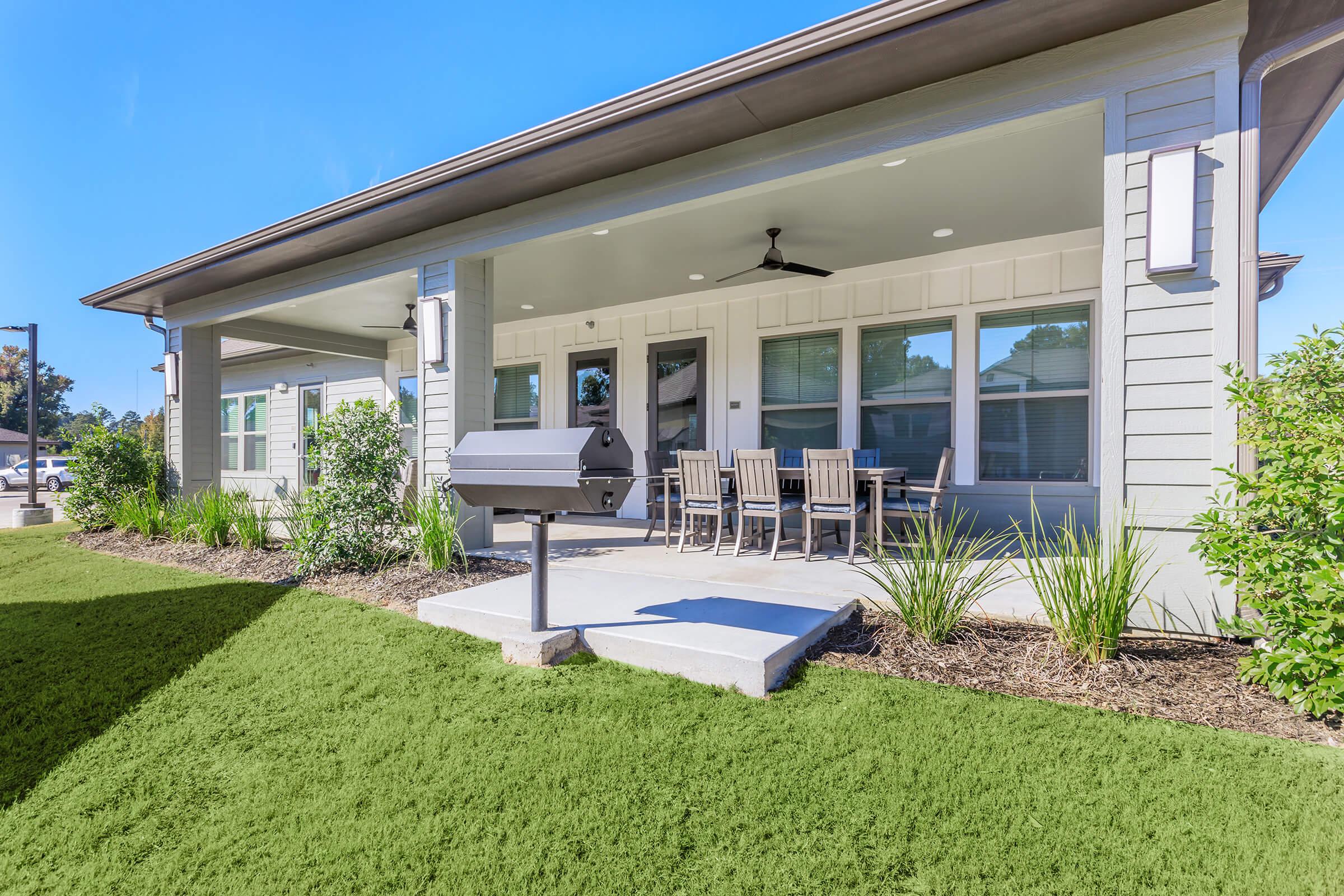 a large lawn in front of a building