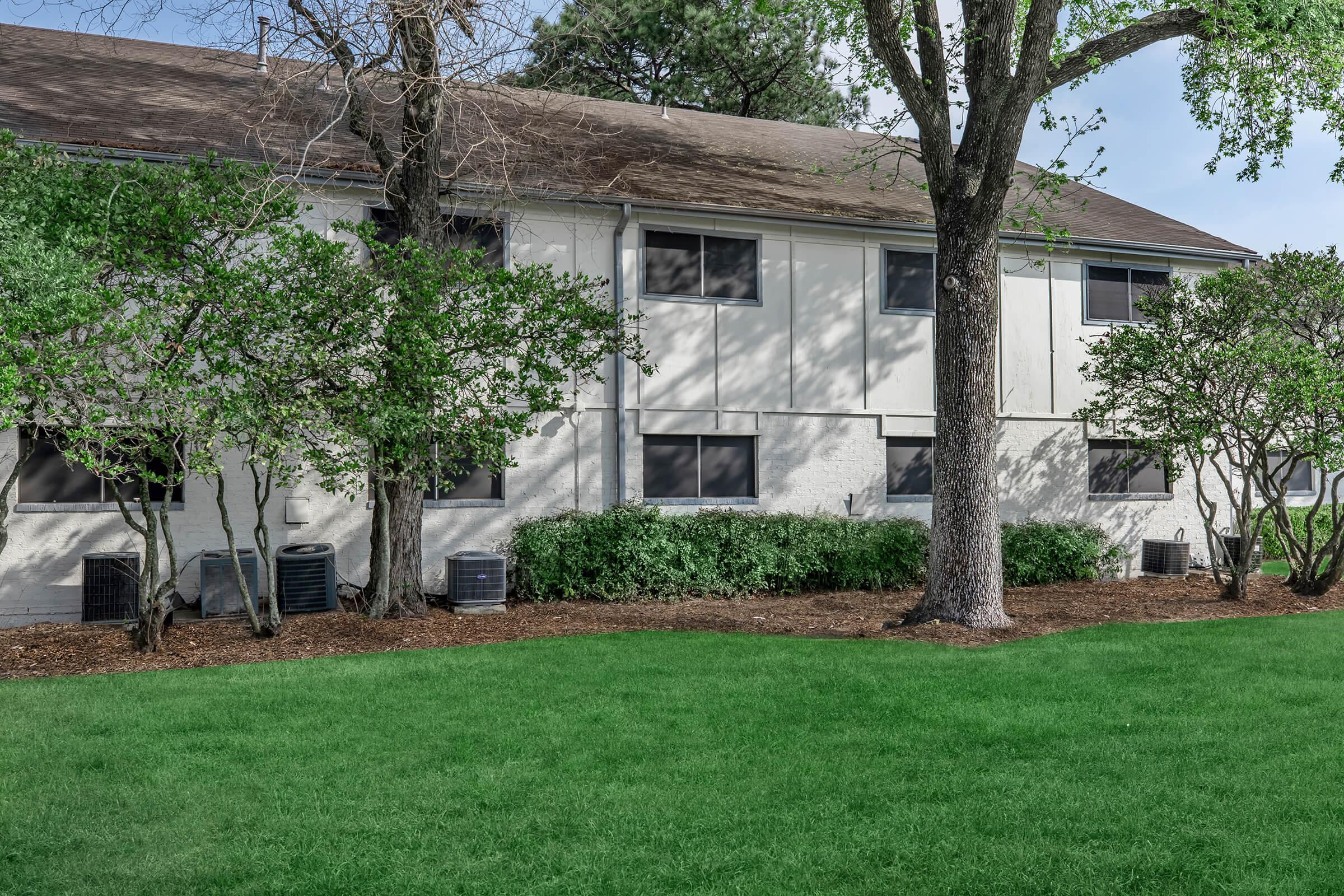 a large lawn in front of a house