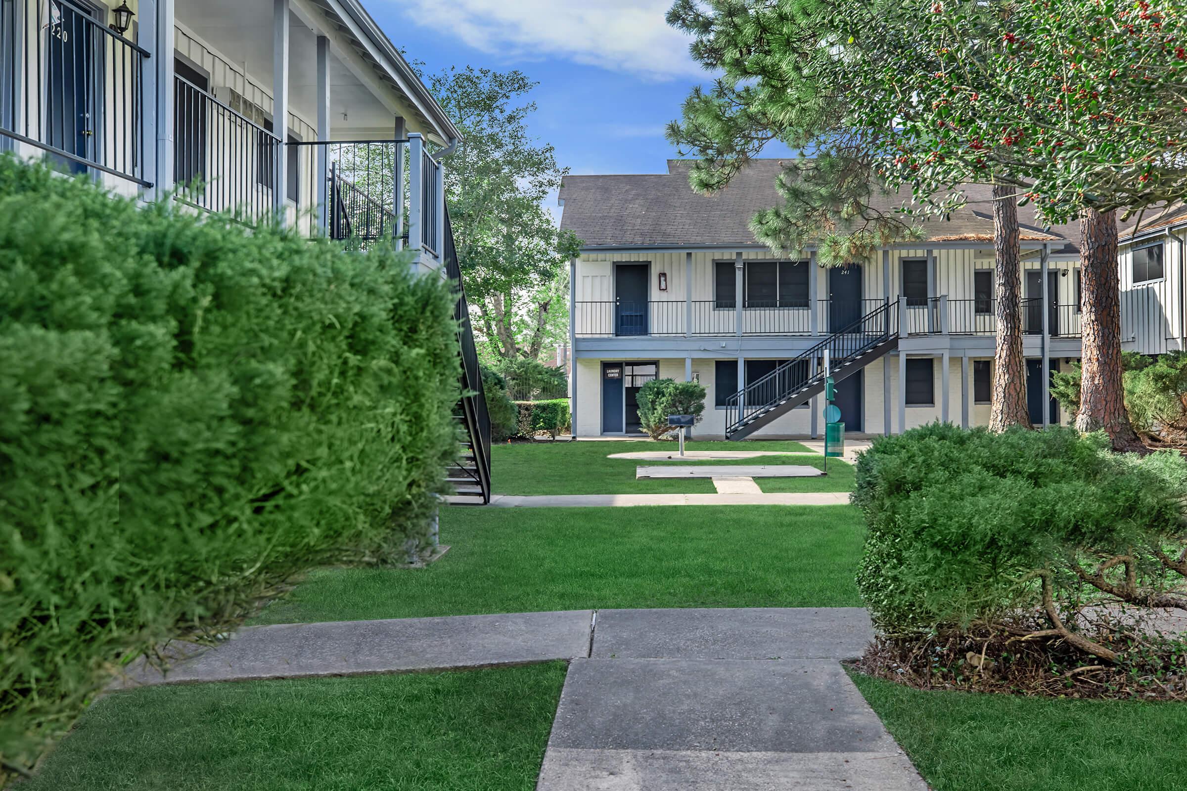 a large lawn in front of a house