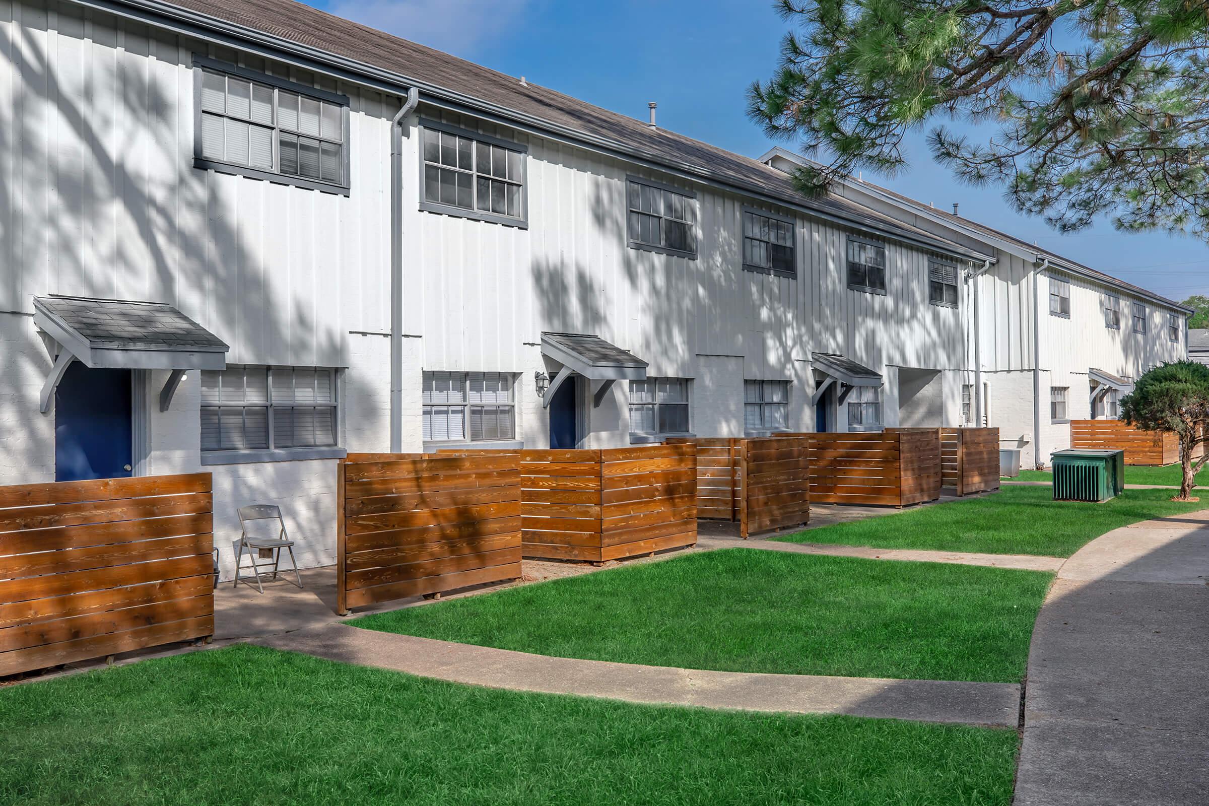 a large lawn in front of a house