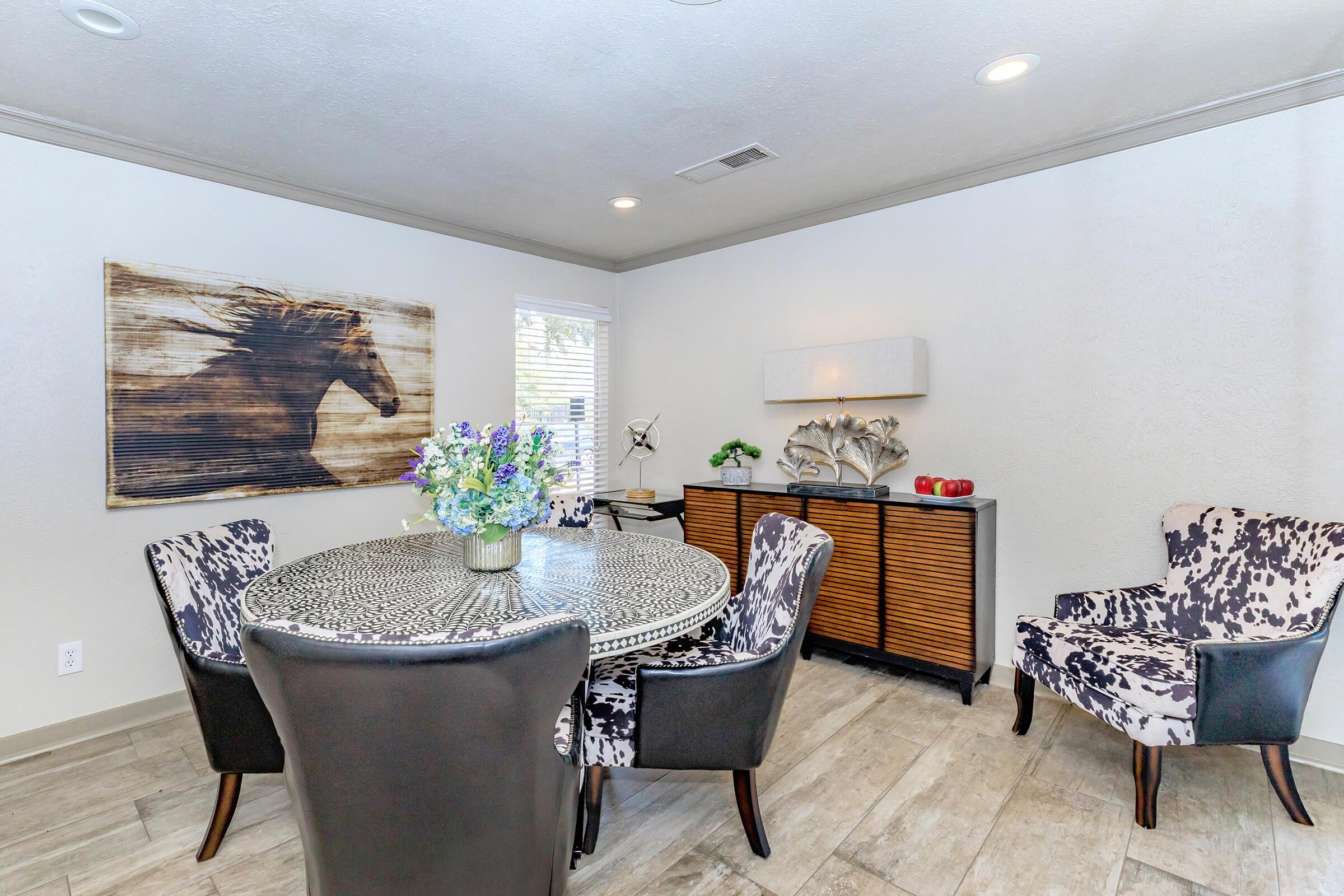 a living room filled with furniture and a fireplace