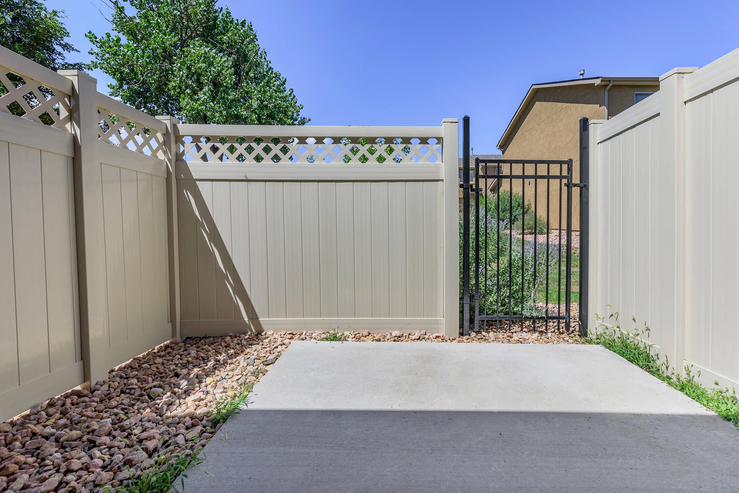 a building next to a fence