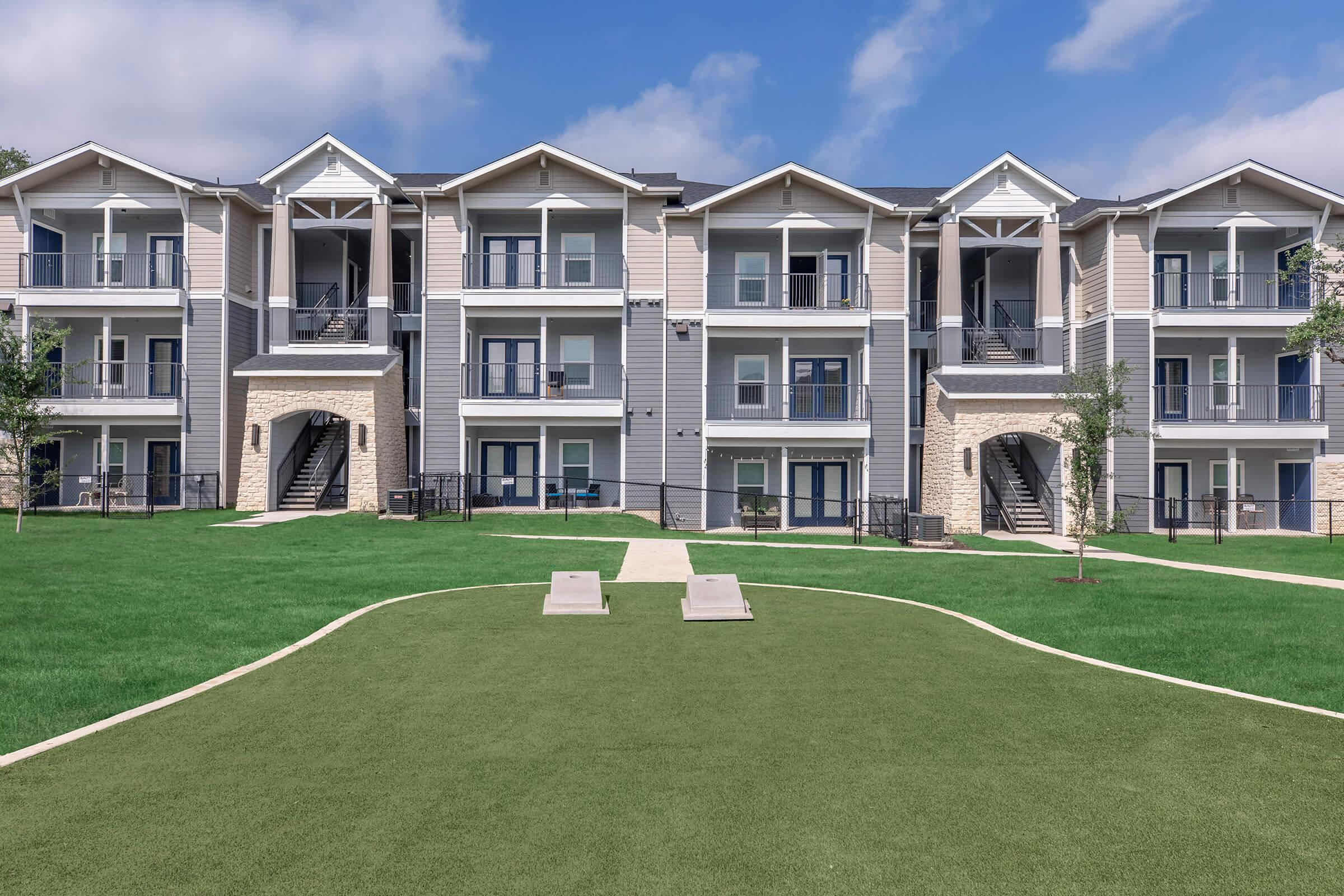 a large lawn in front of a house