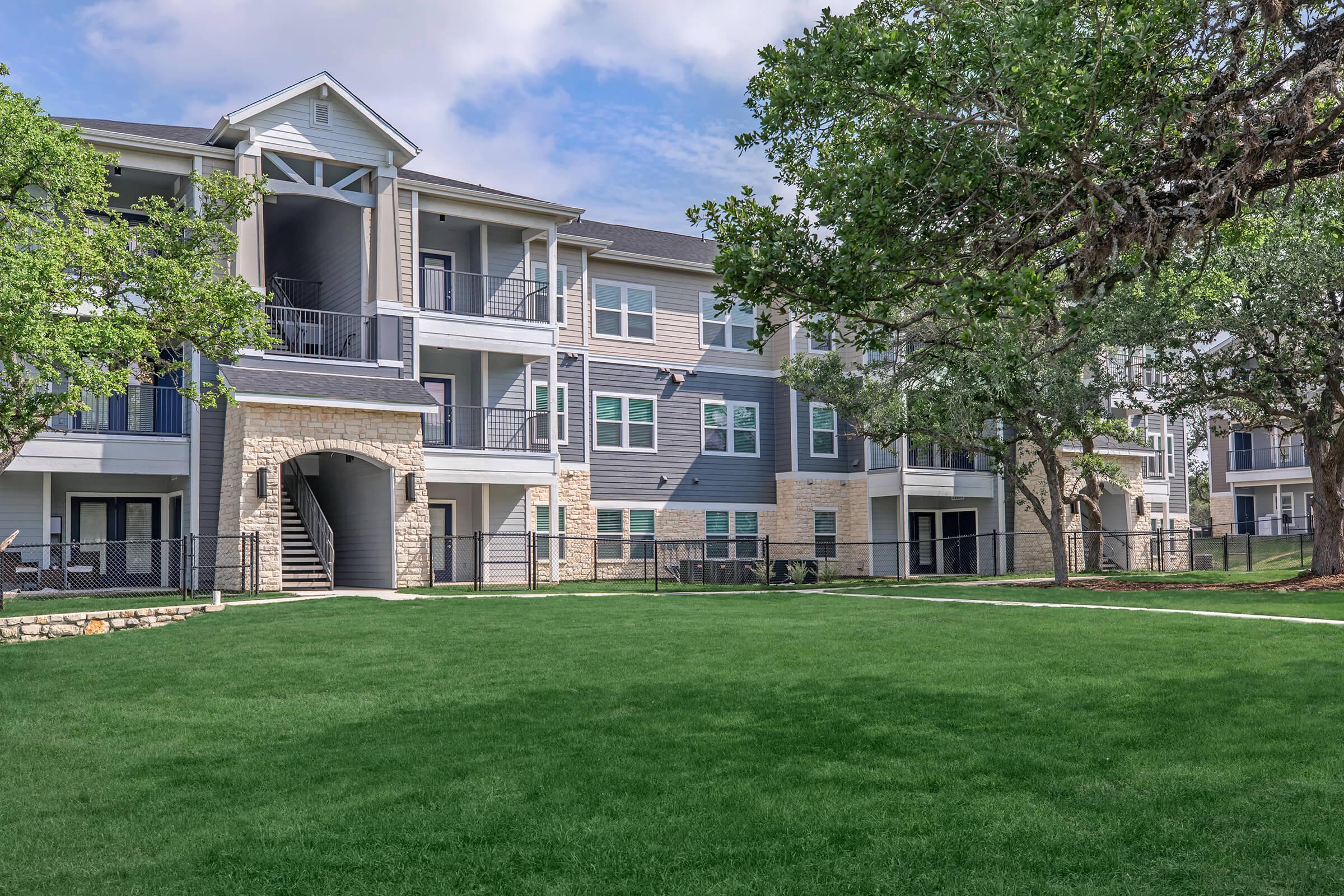 a large lawn in front of a building