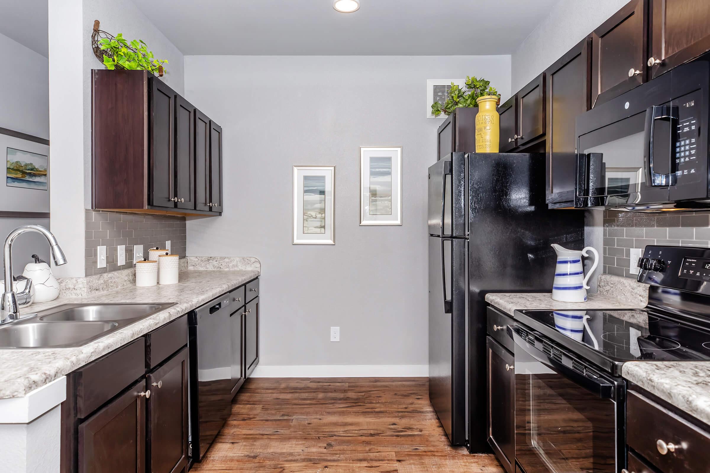 a modern kitchen with stainless steel appliances