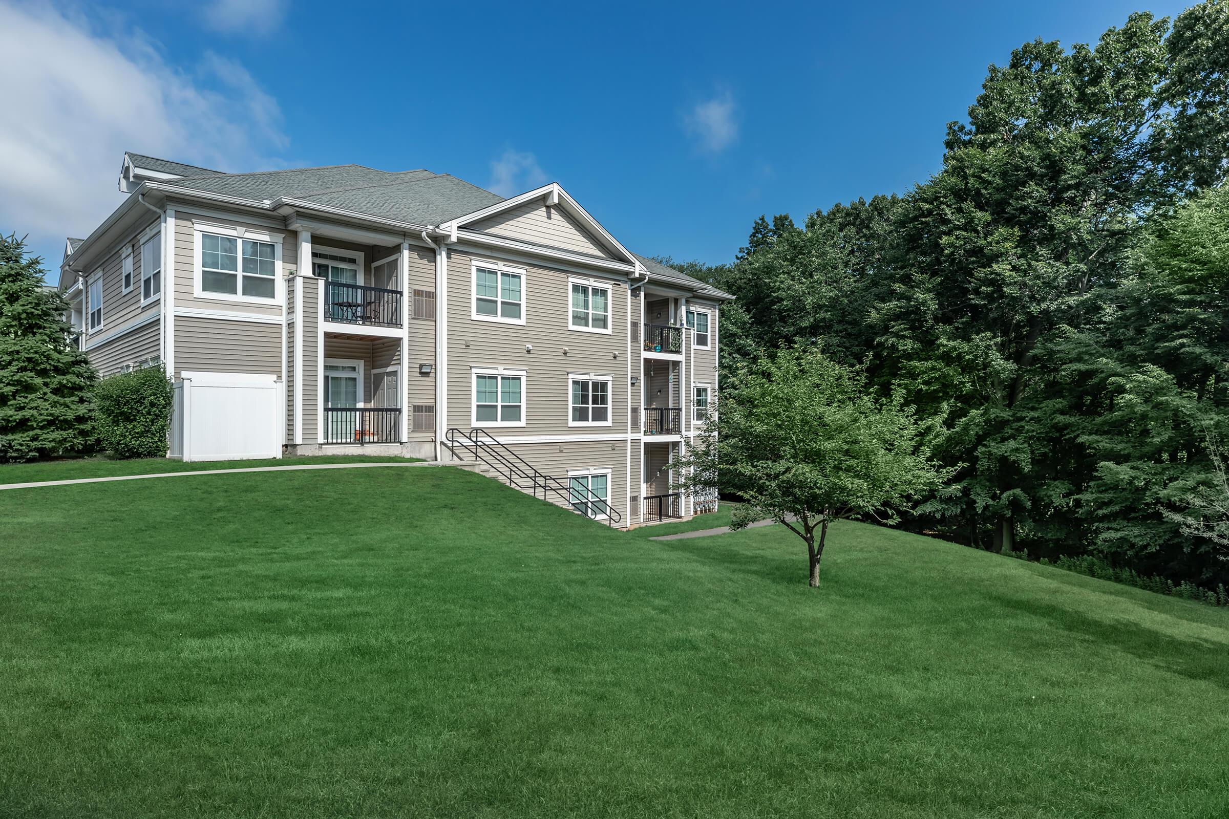 a large lawn in front of a house