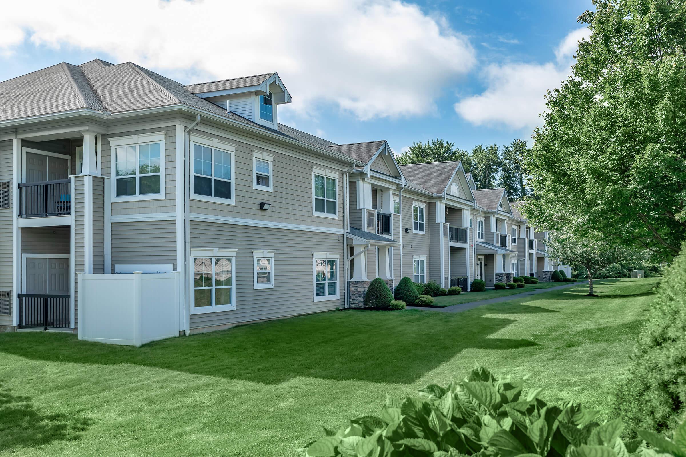 a large lawn in front of a house