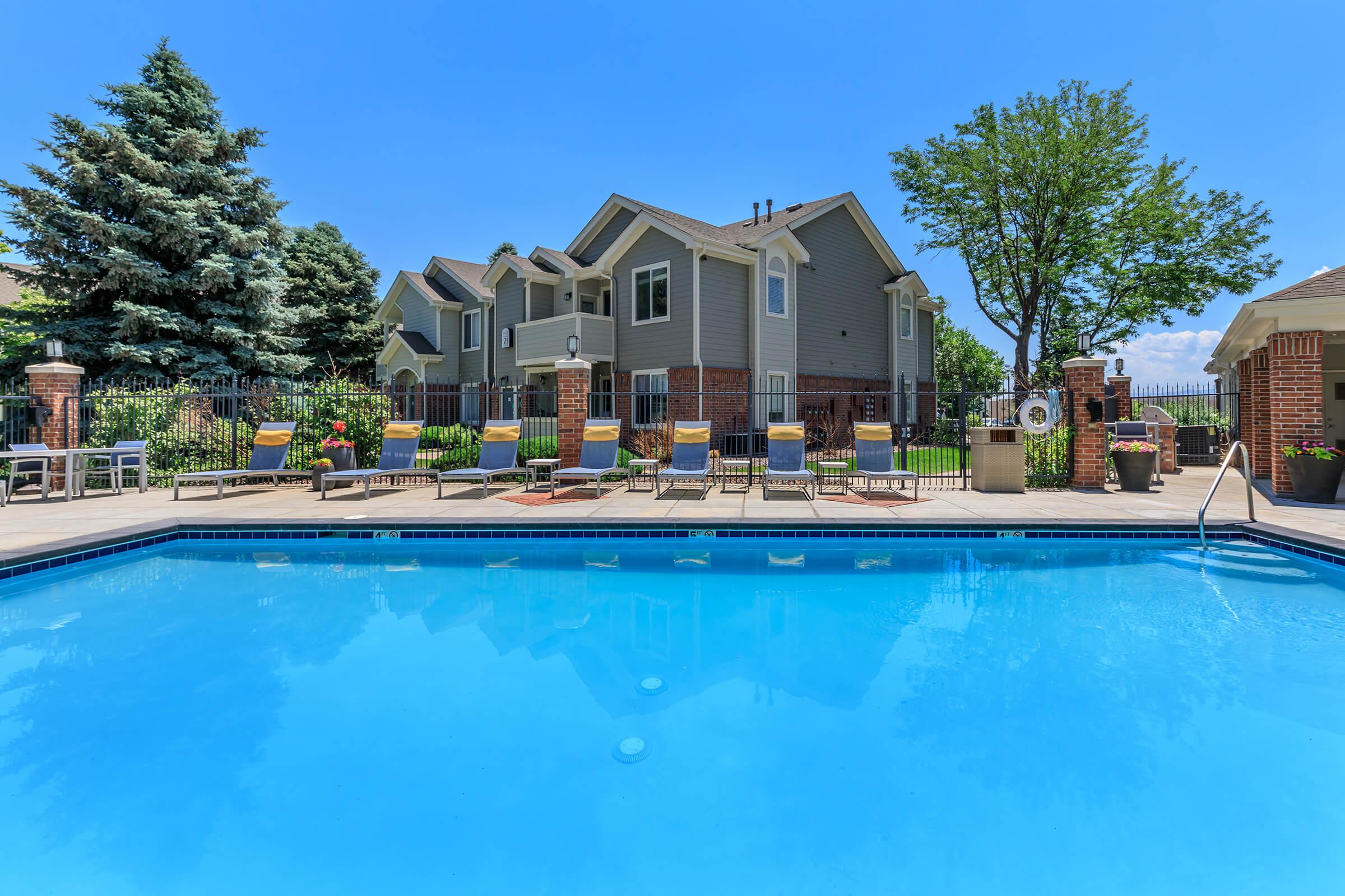 SOAK UP THE SUN BY OUR SHIMMERING SWIMMING POOL