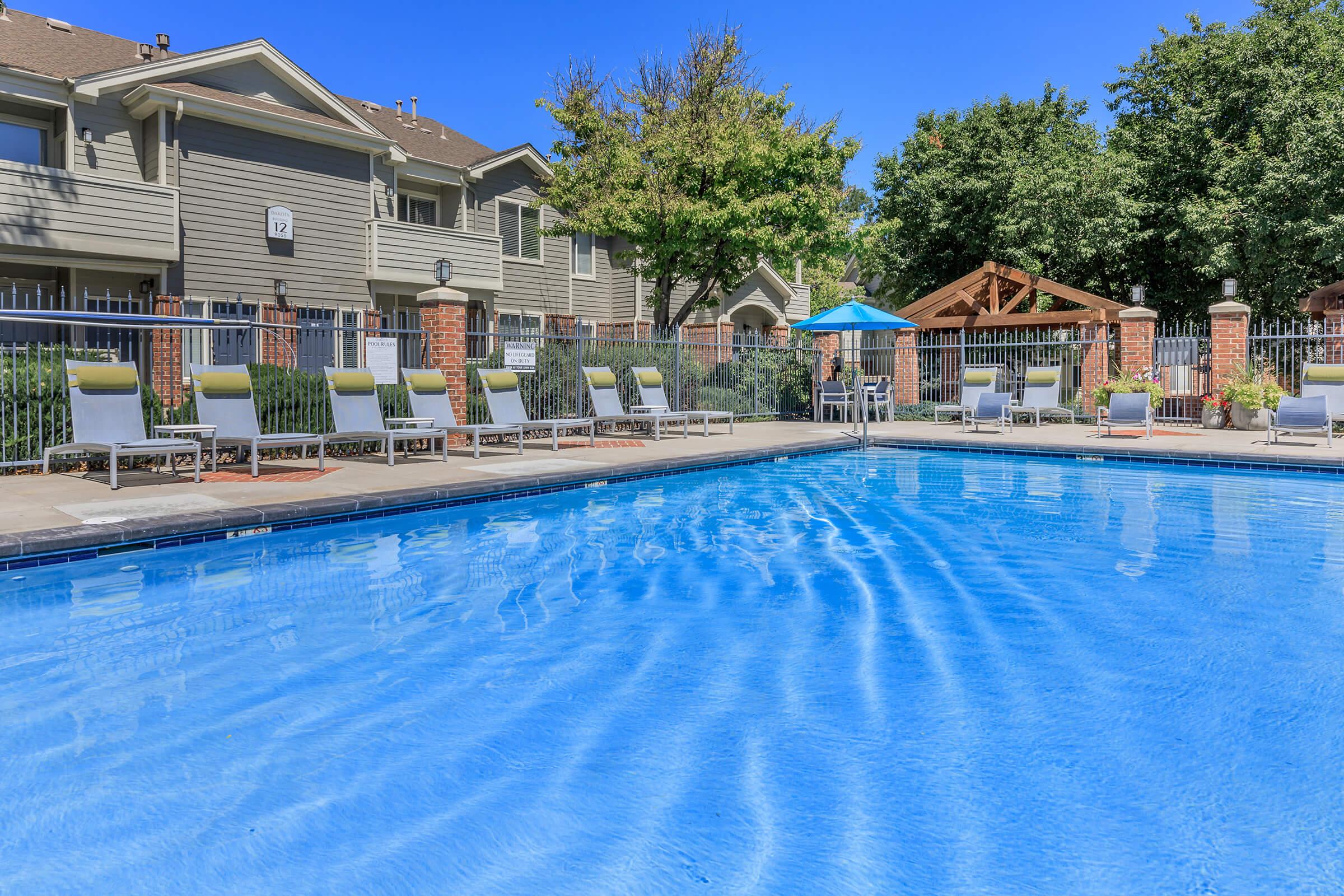 a house with a large pool of water