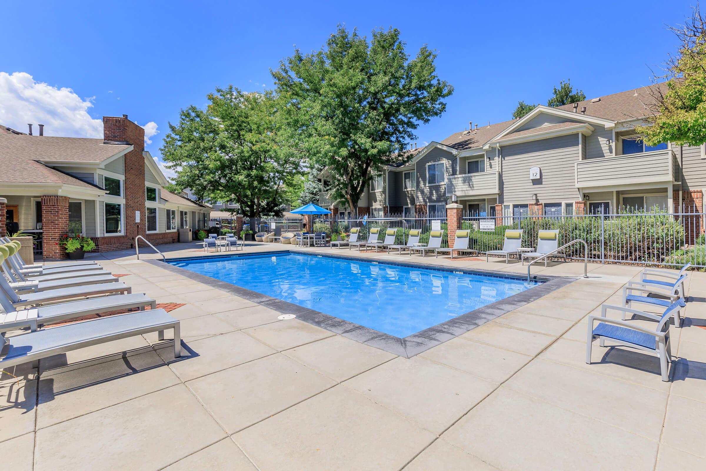 a pool next to a building