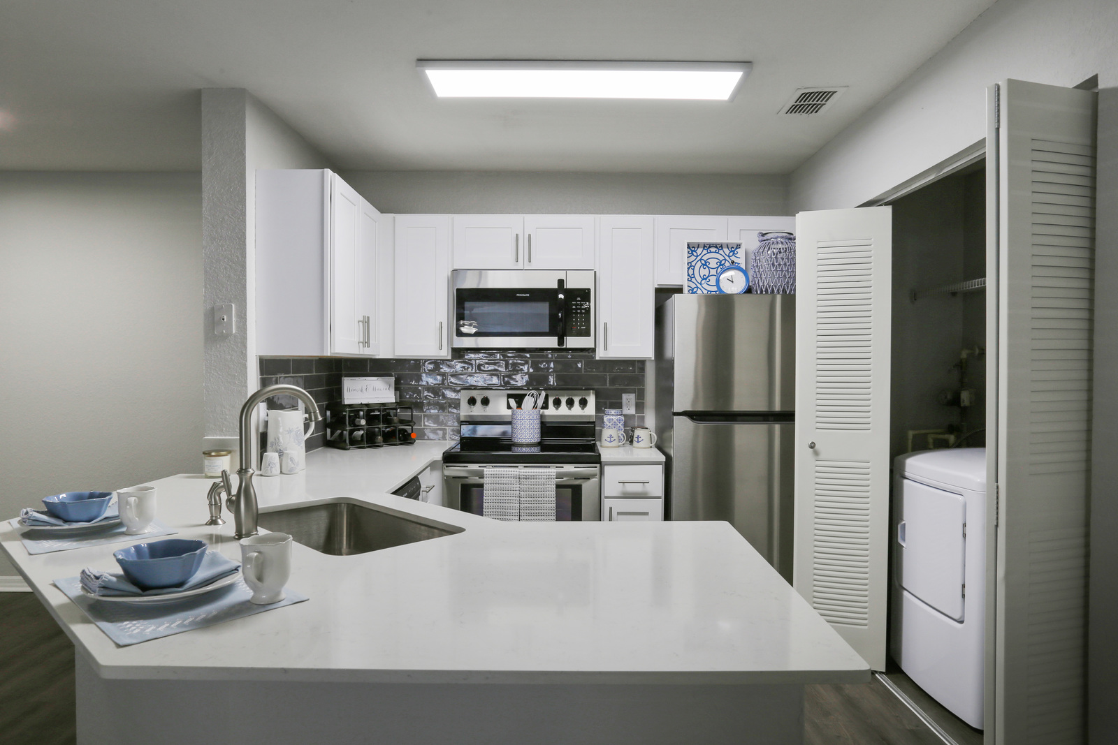 ALL-ELECTRIC GOURMET KITCHENS AT CLUB AT DANWORTH