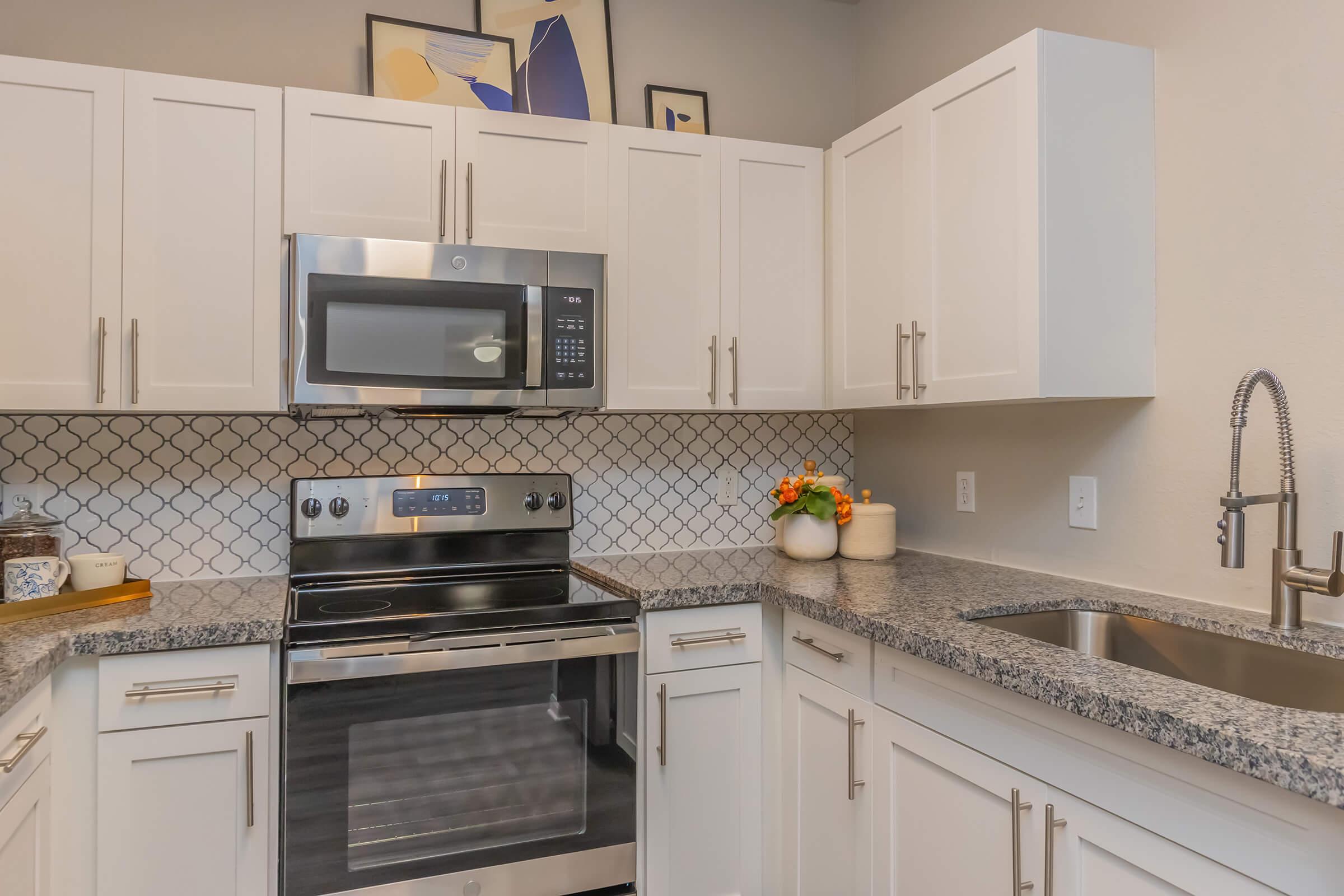 a kitchen with stainless steel appliances