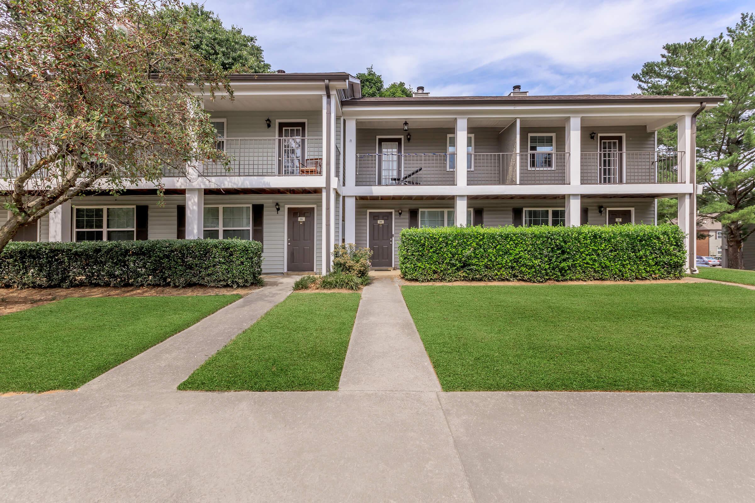 a large lawn in front of a house