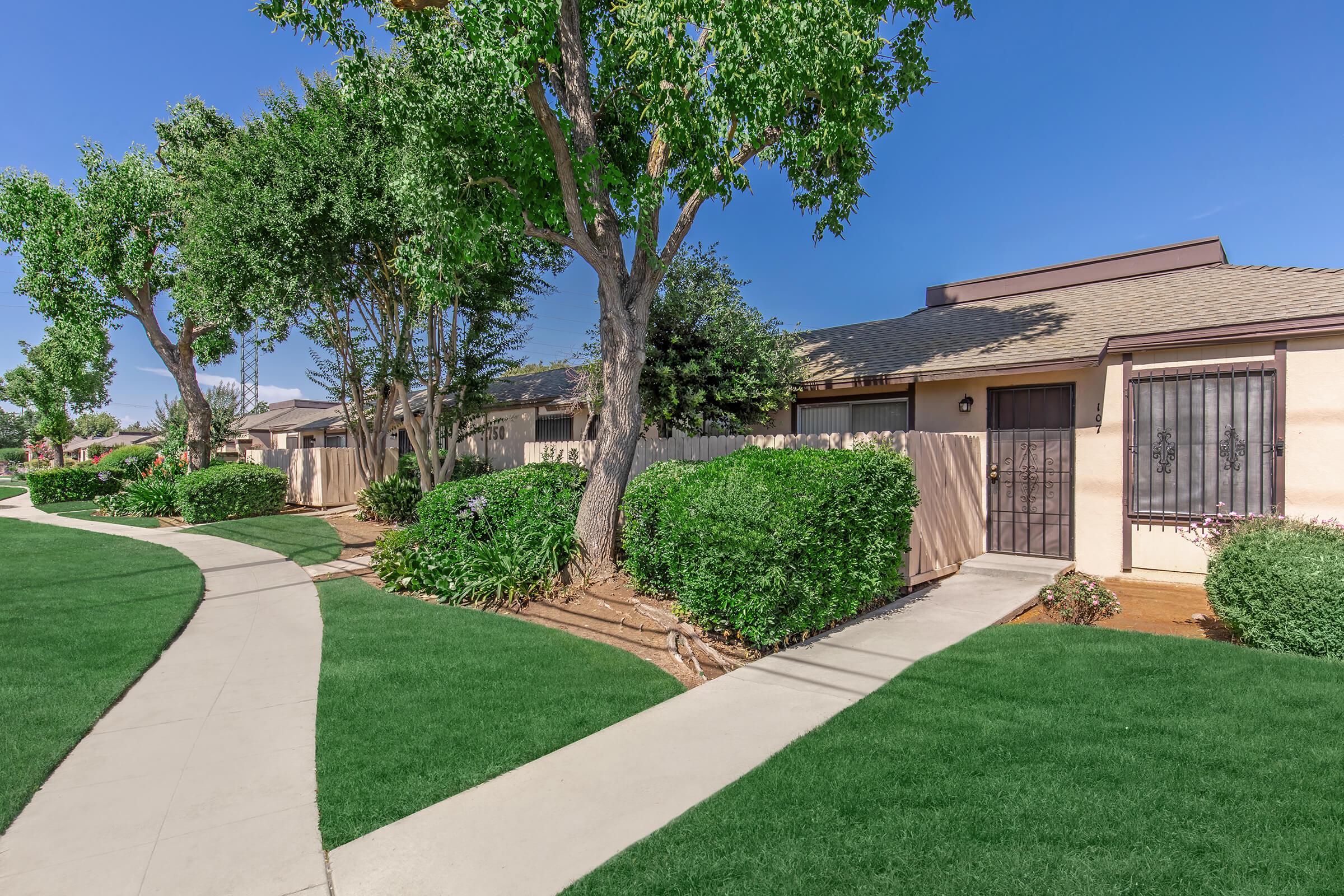 a large lawn in front of a house