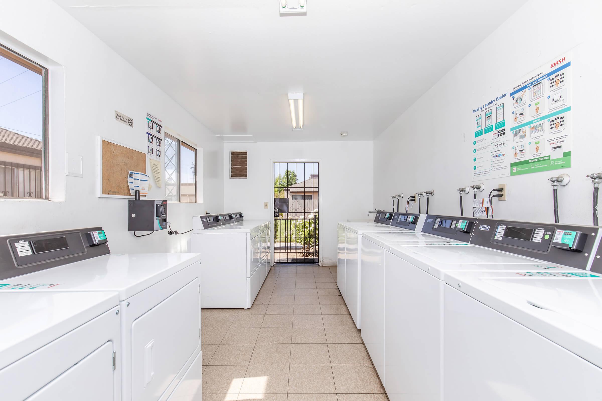 a kitchen with a sink and a refrigerator