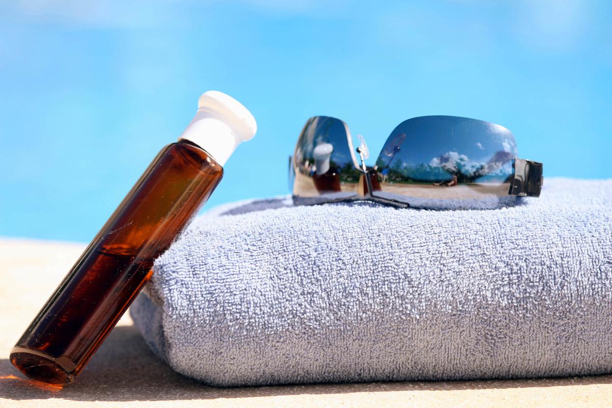 lotion-towel-sunglasses iStock_000005942652Large.jpg