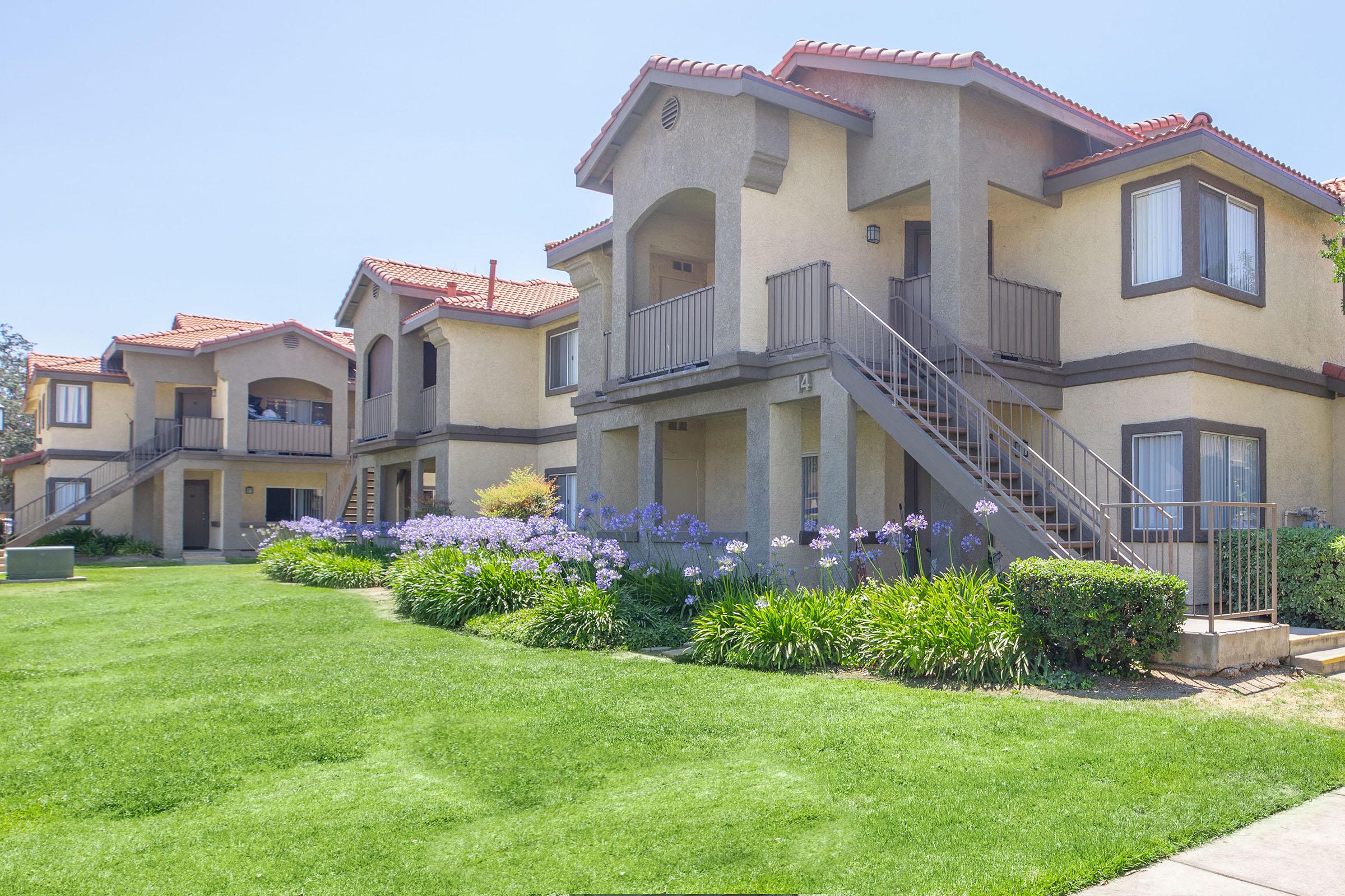 a large lawn in front of a house