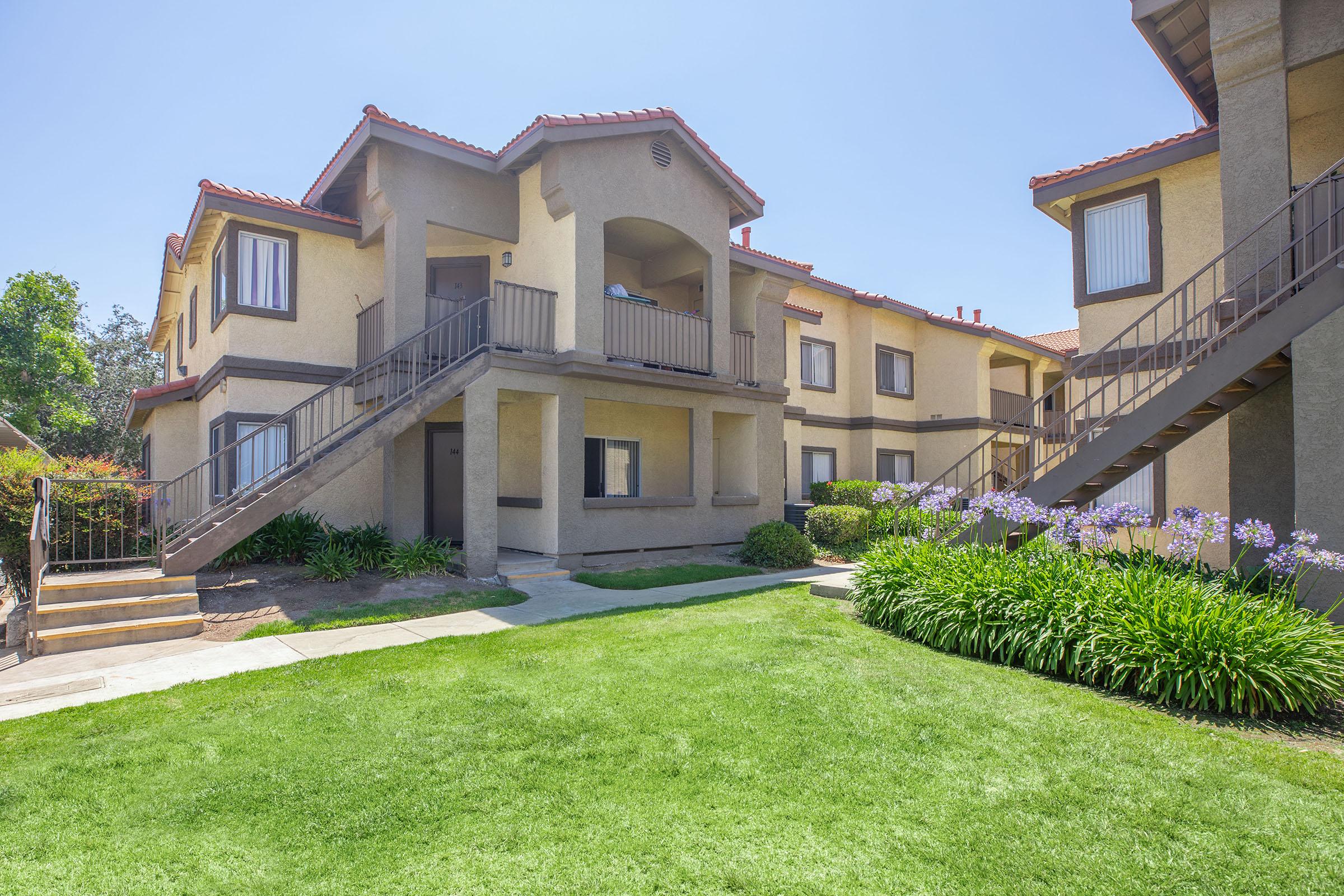 a large lawn in front of a house