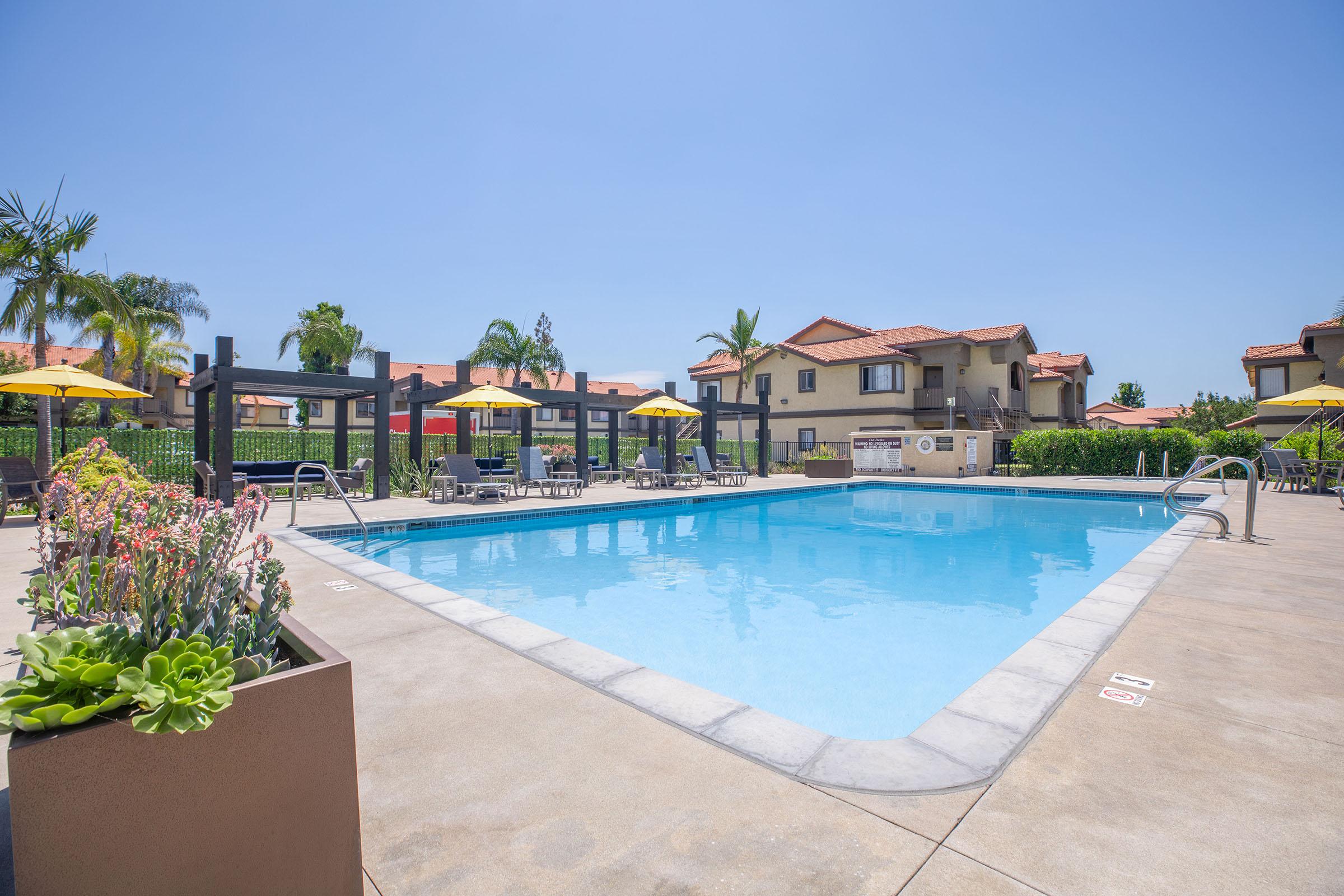 a pool next to a building